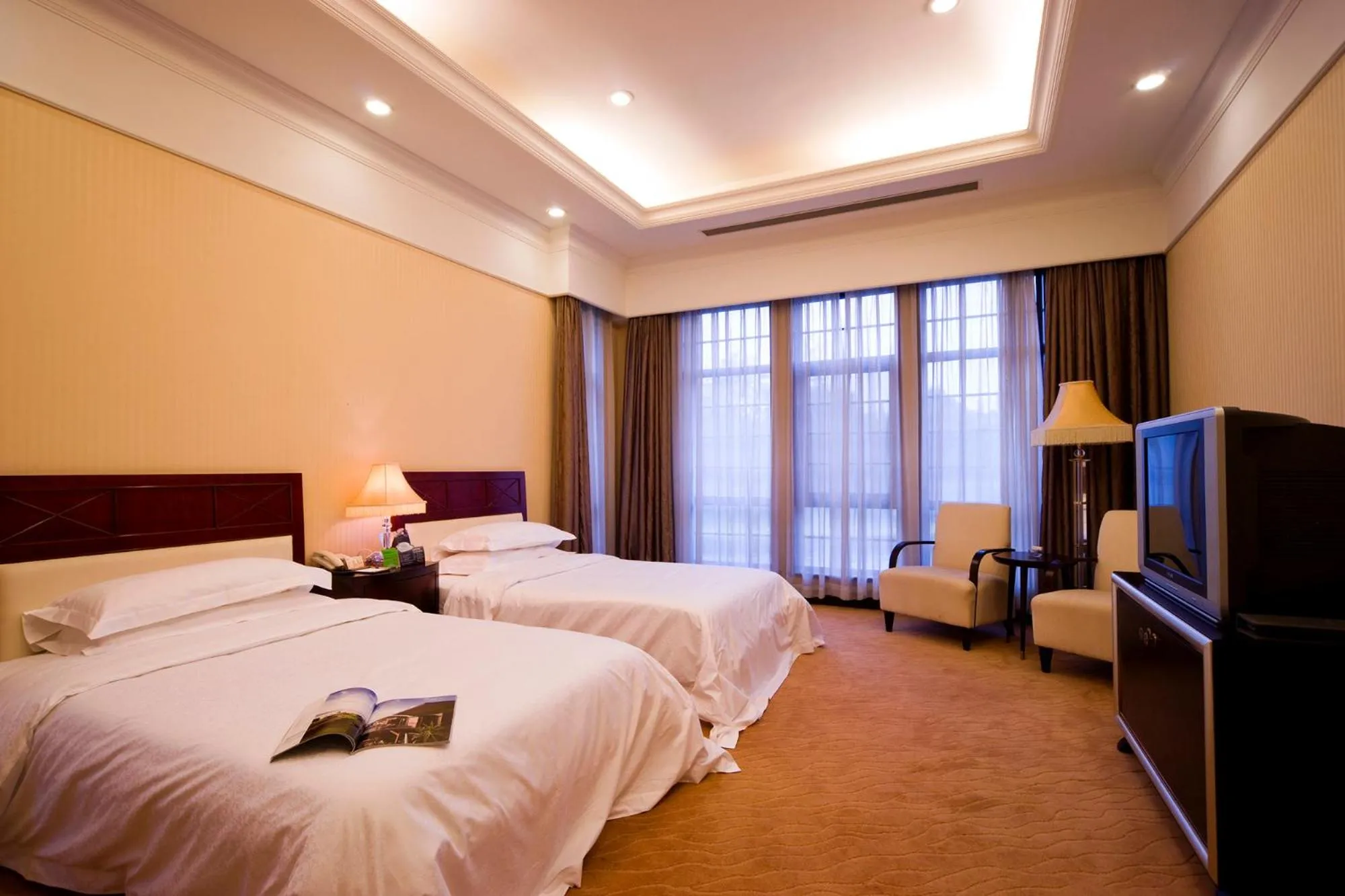 Bed in Ramada Plaza Sino-Bay Shanghai