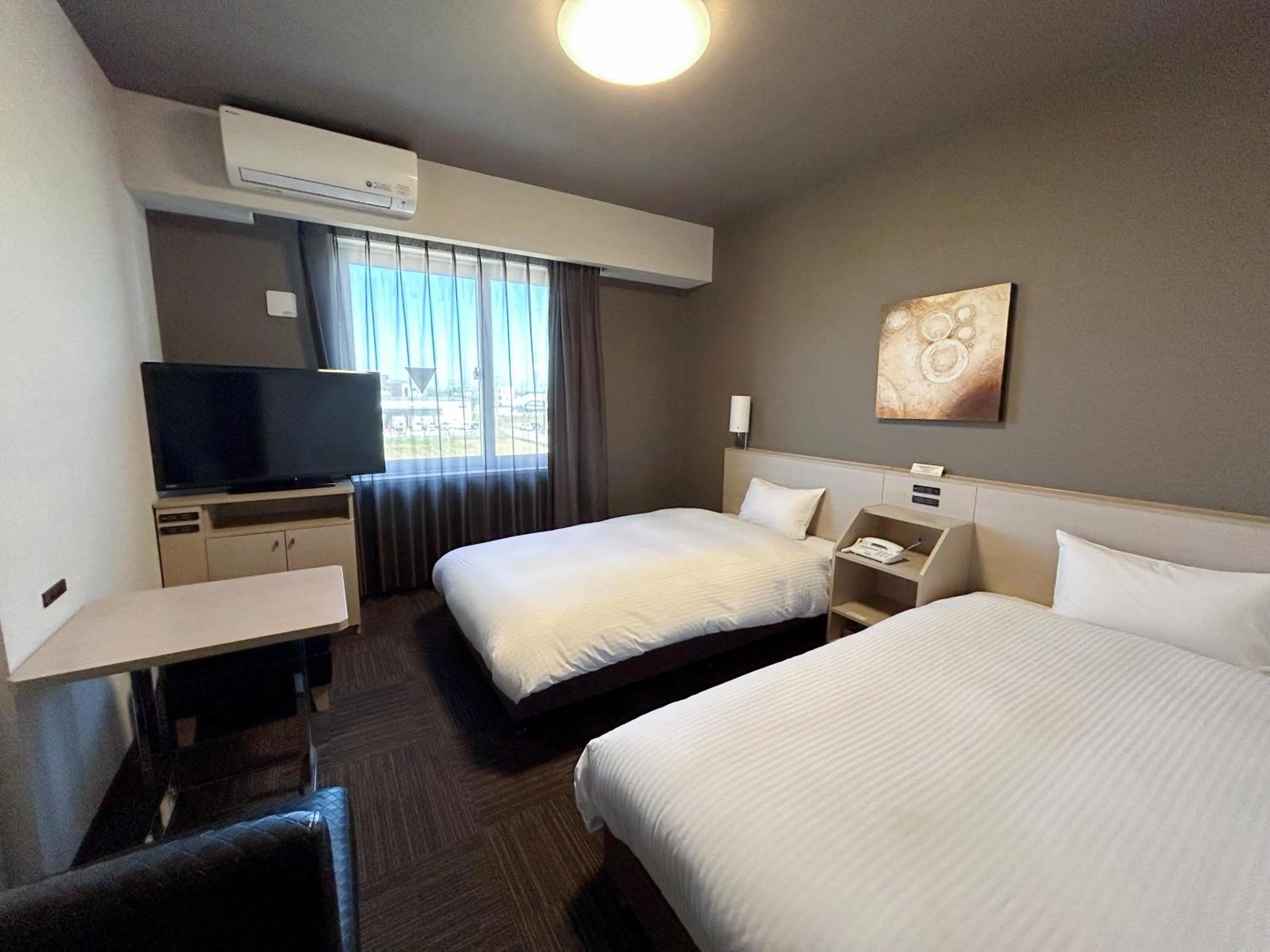 Photo of the whole room, Bed in Route Inn Grantia Komatsu Airport