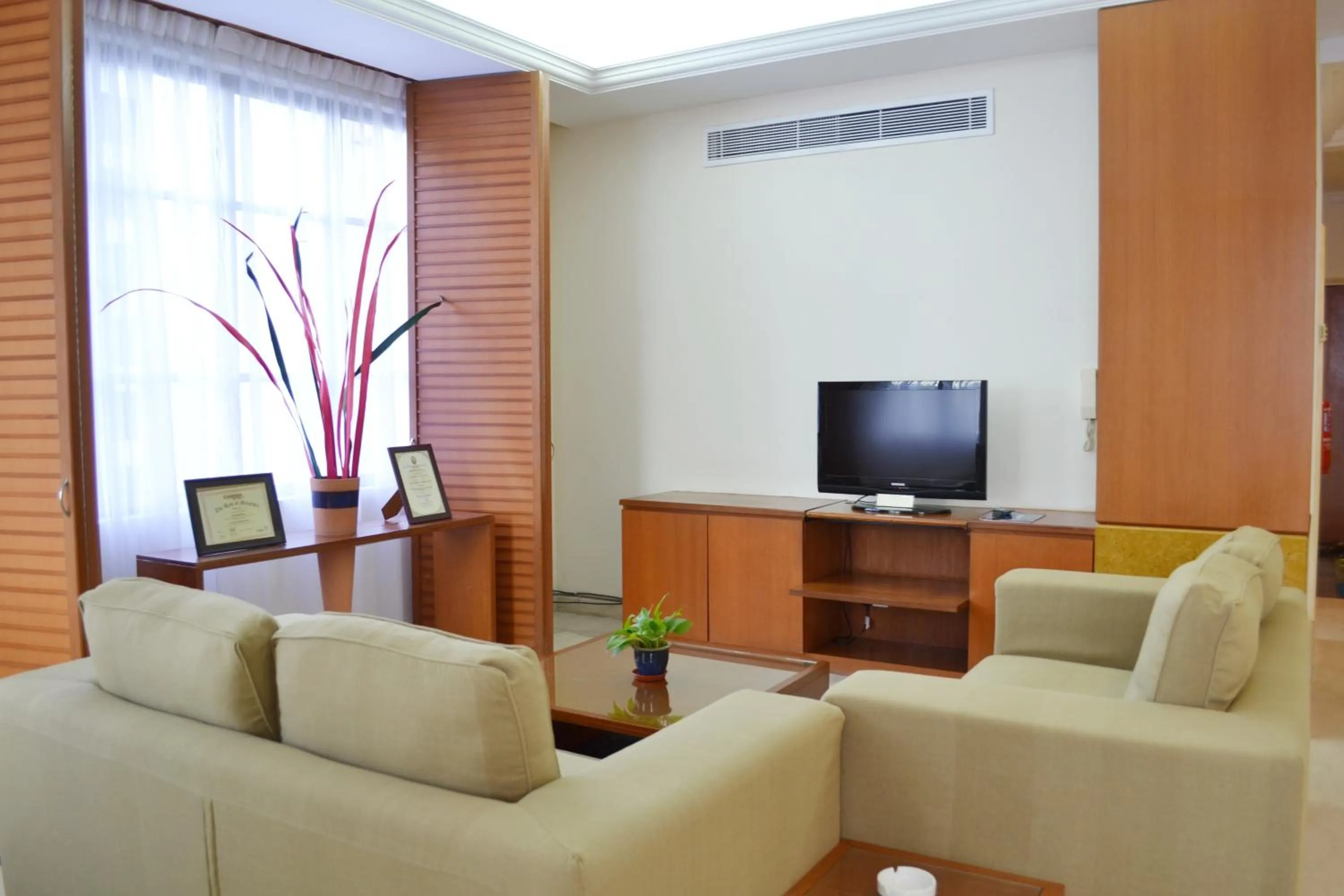 Living room in The Maple Suite