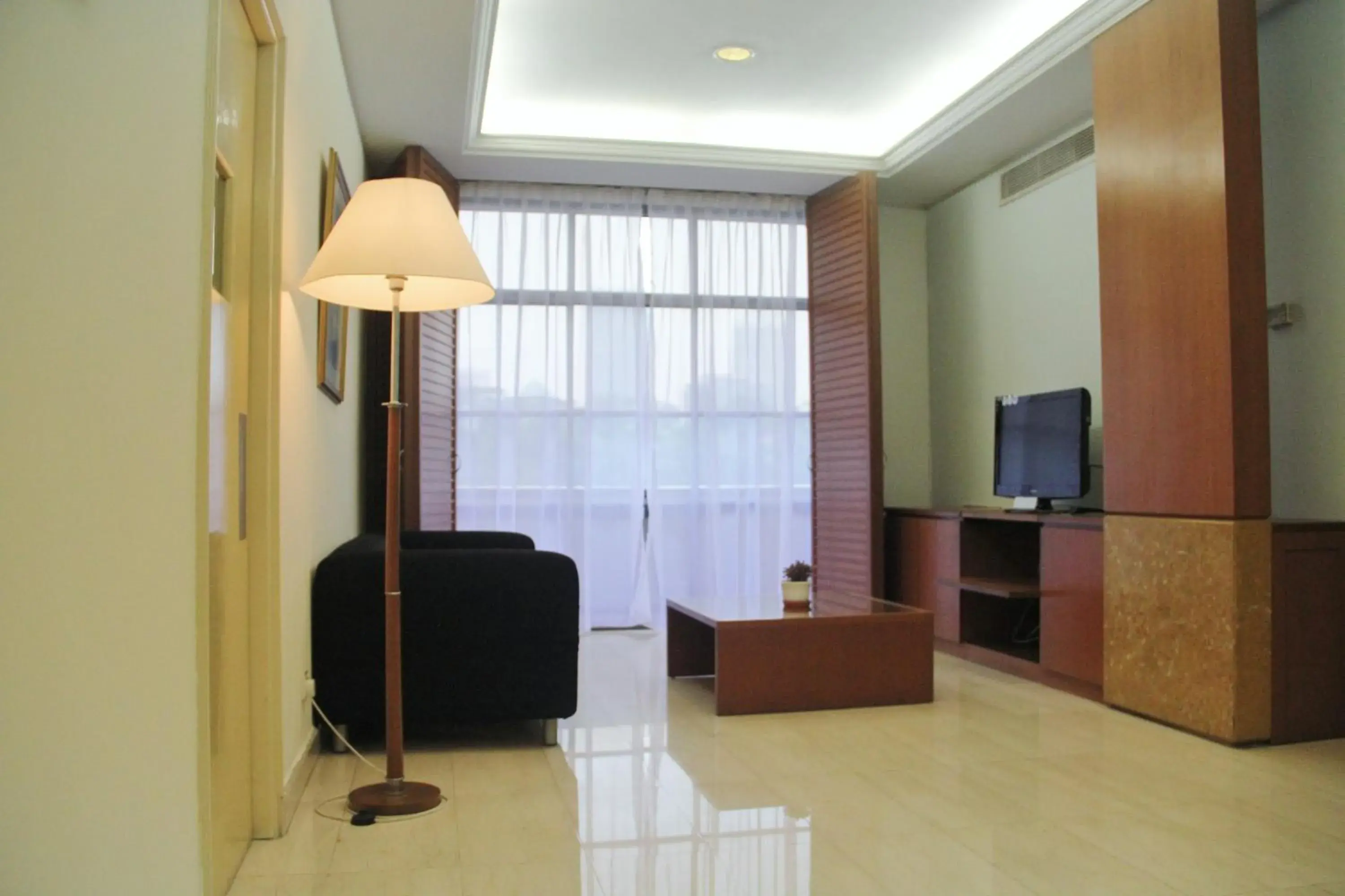 Living room in The Maple Suite Living room in The Maple Suite