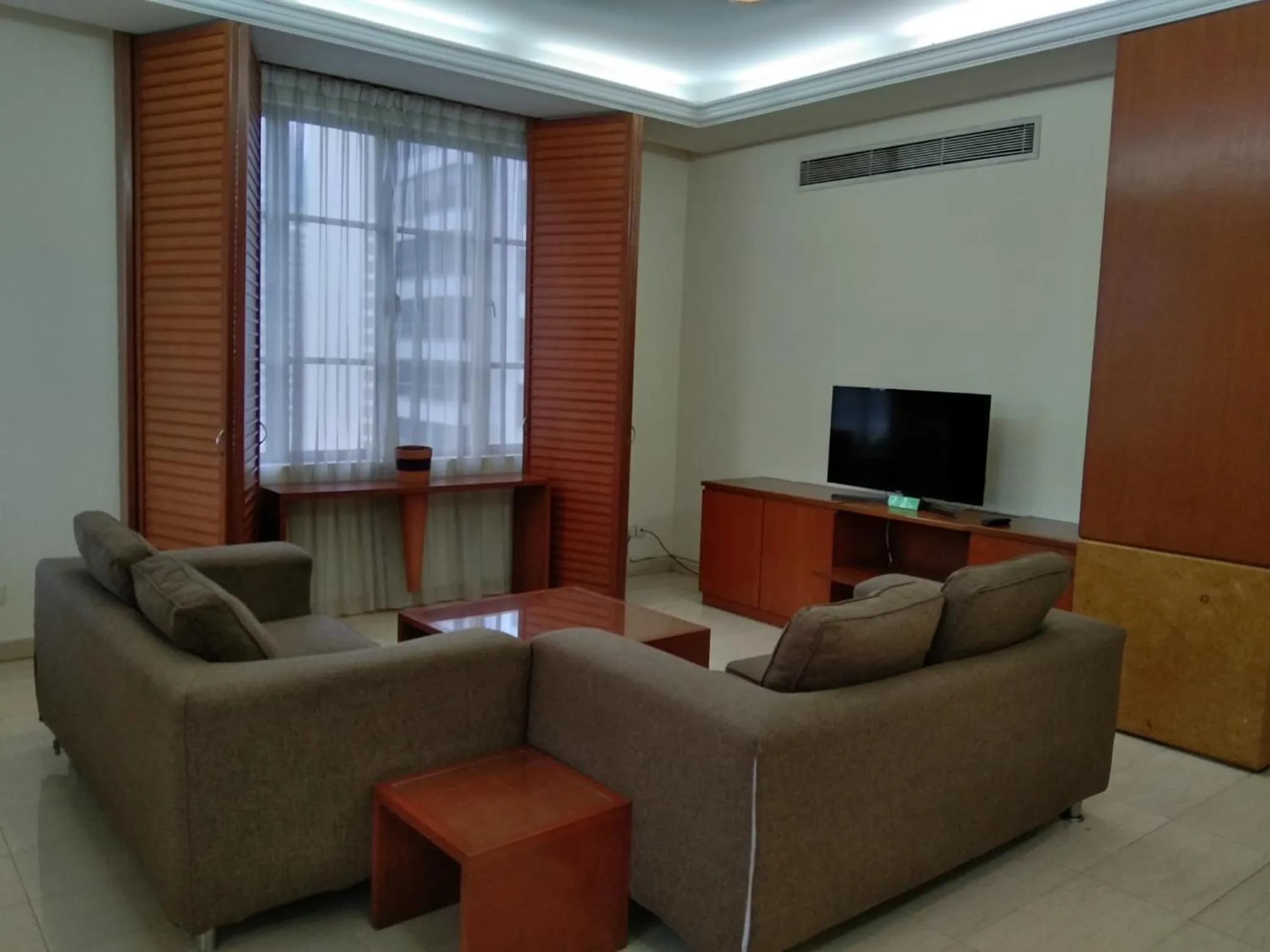 Living room in The Maple Suite