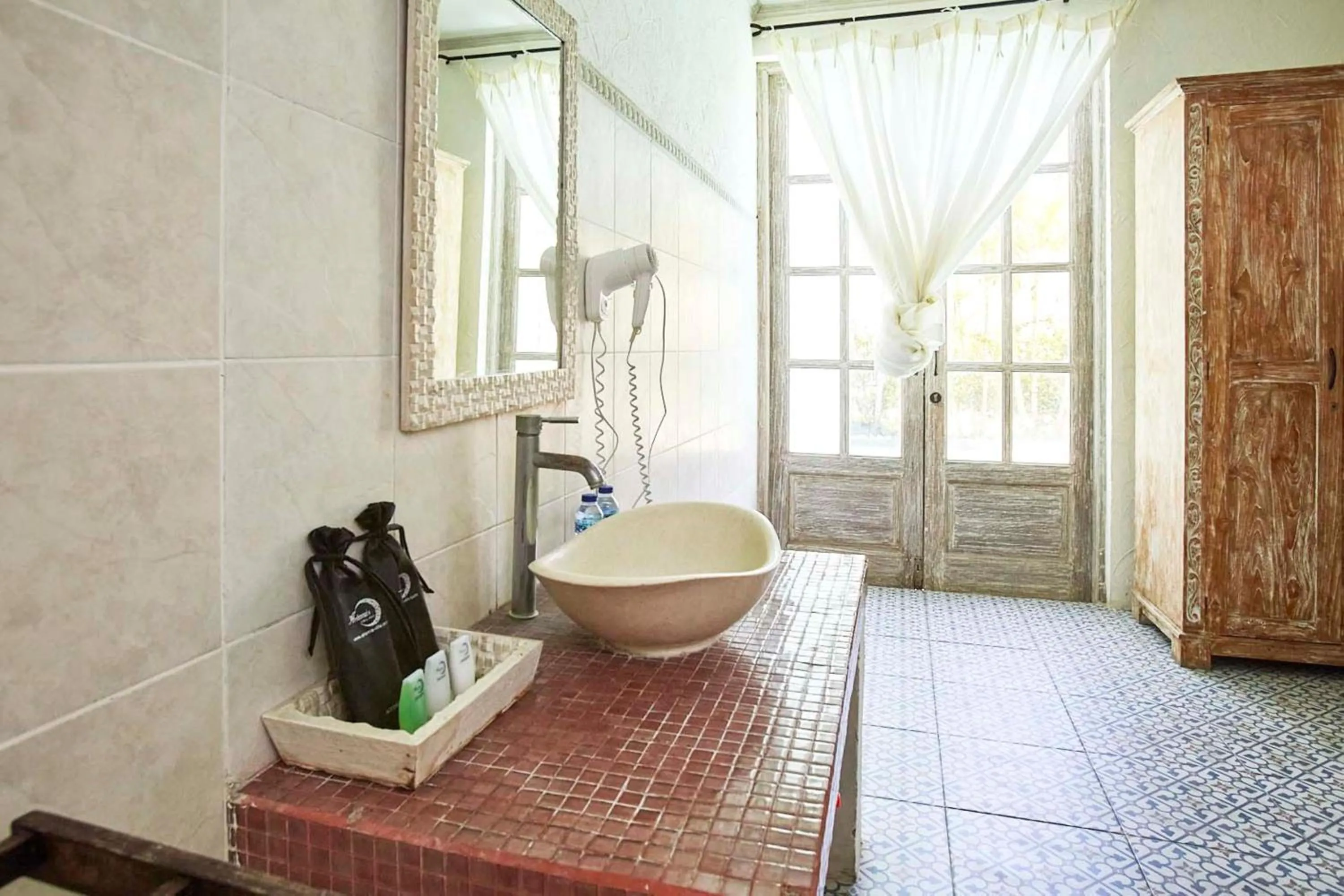 Bathroom in Artemis Villa Hotel