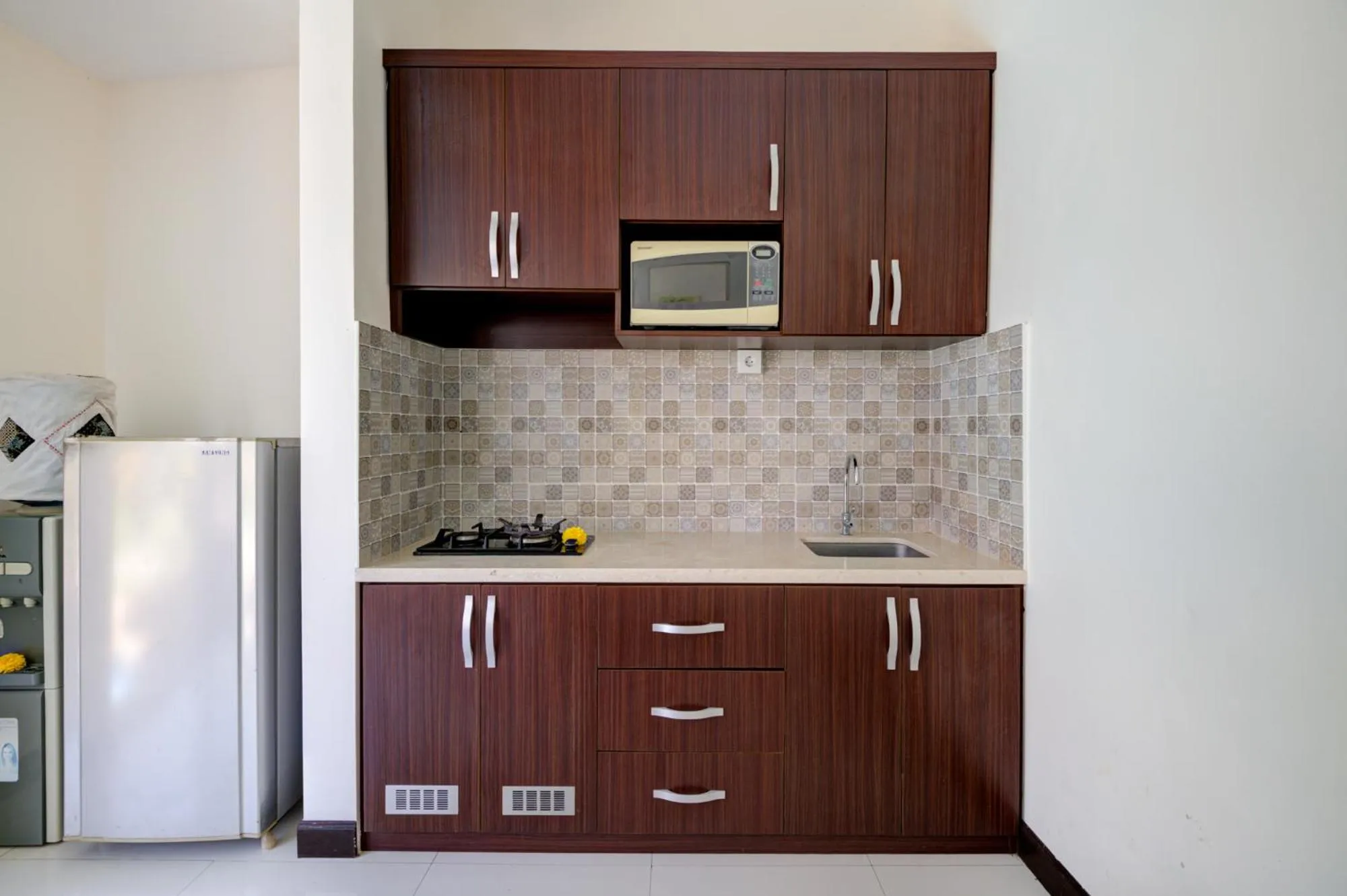 Kitchen or kitchenette in Gracia Bali Villas & Apartment Managed by Manara