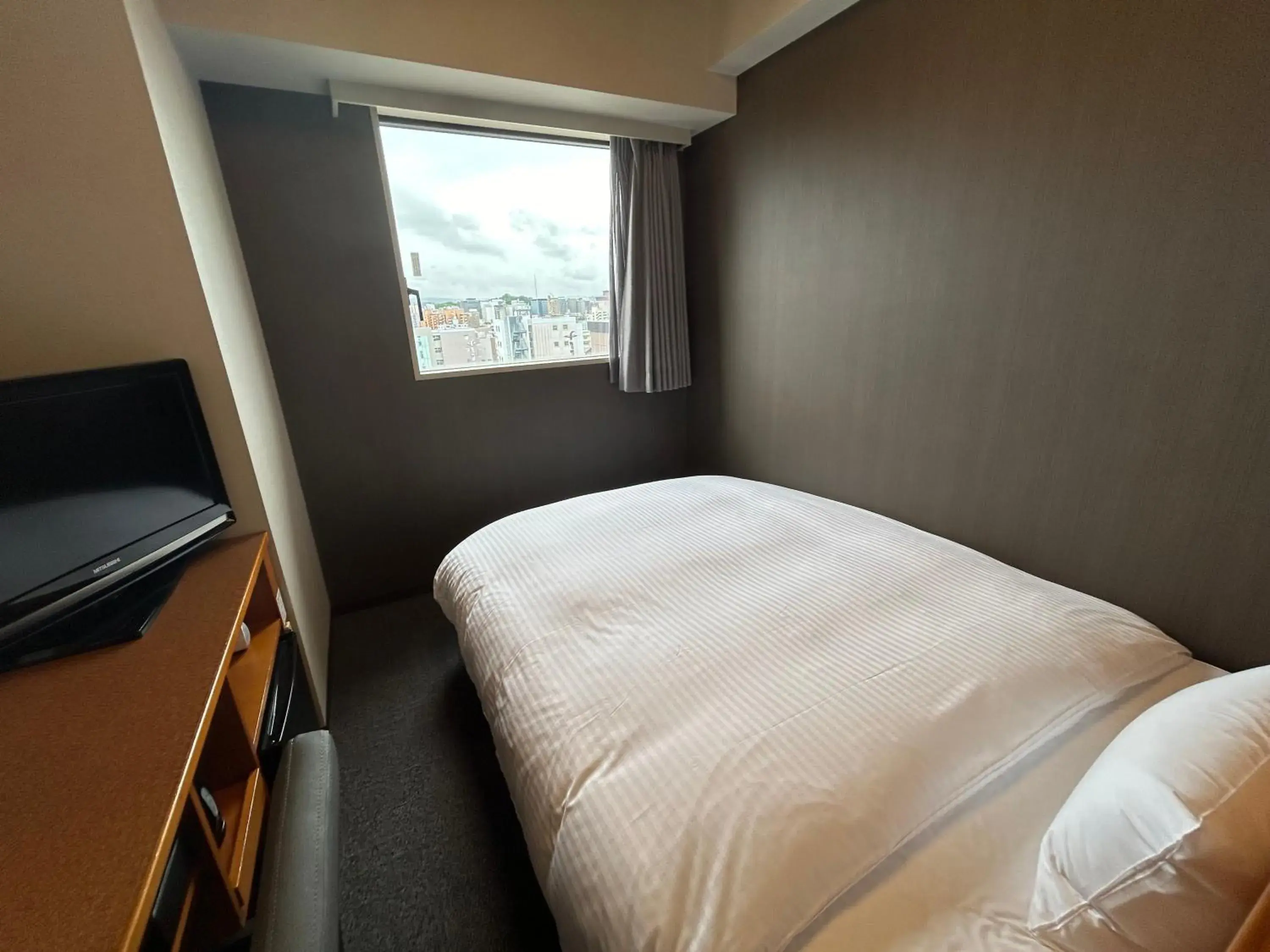 Photo of the whole room, Bed in Hotel Route-Inn Kanazawa Ekimae Photo of the whole room, Bed in Hotel Route-Inn Kanazawa Ekimae
