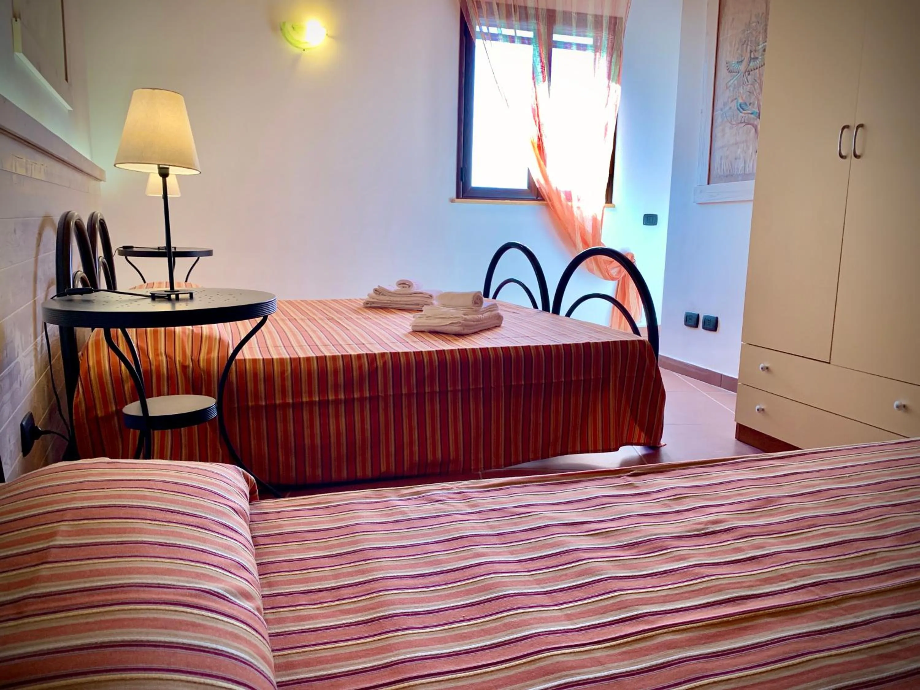 Photo of the whole room, Bed in Residence La Luna Nel Pozzo