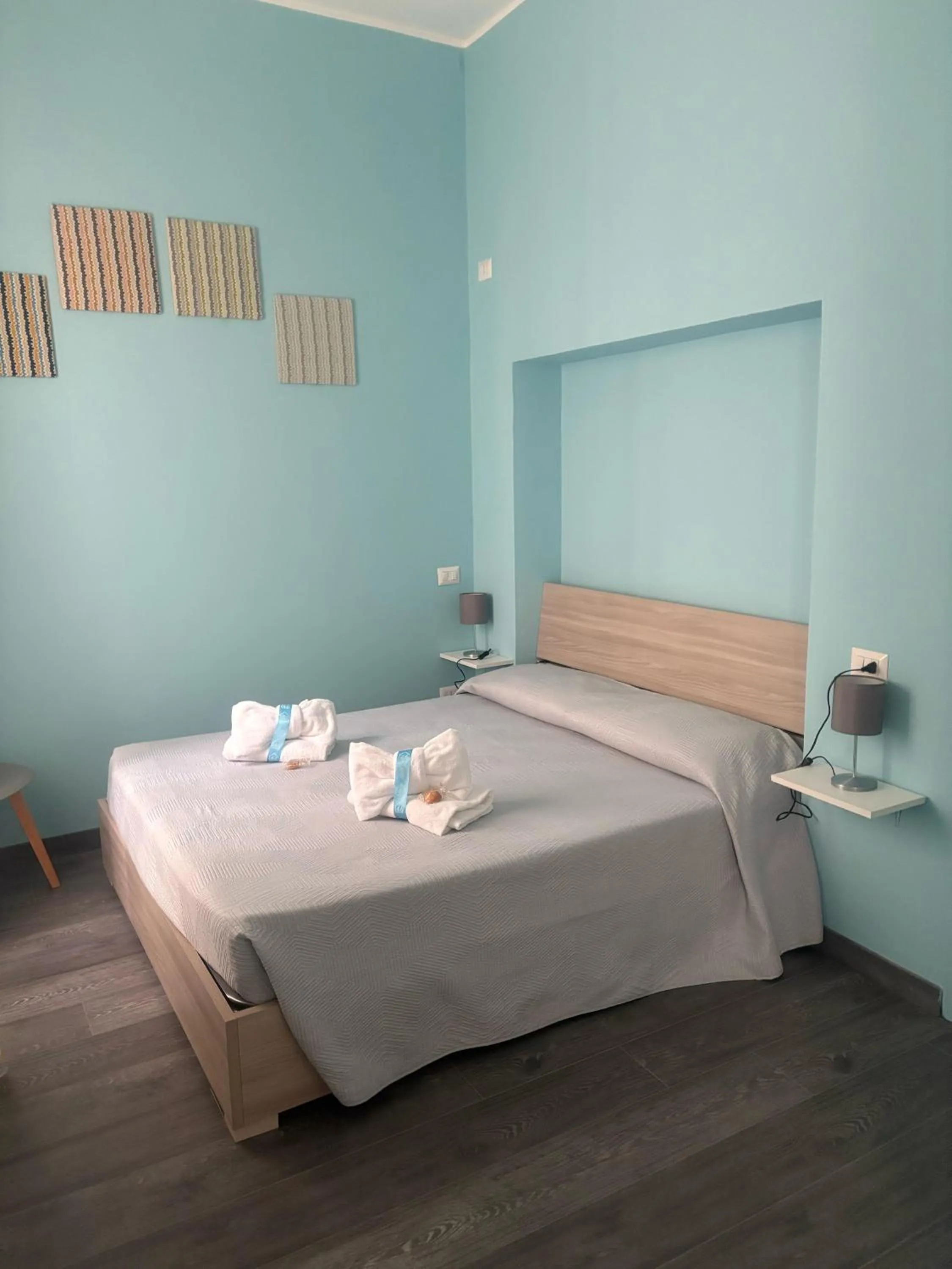 Bed in Regina Margherita Suite