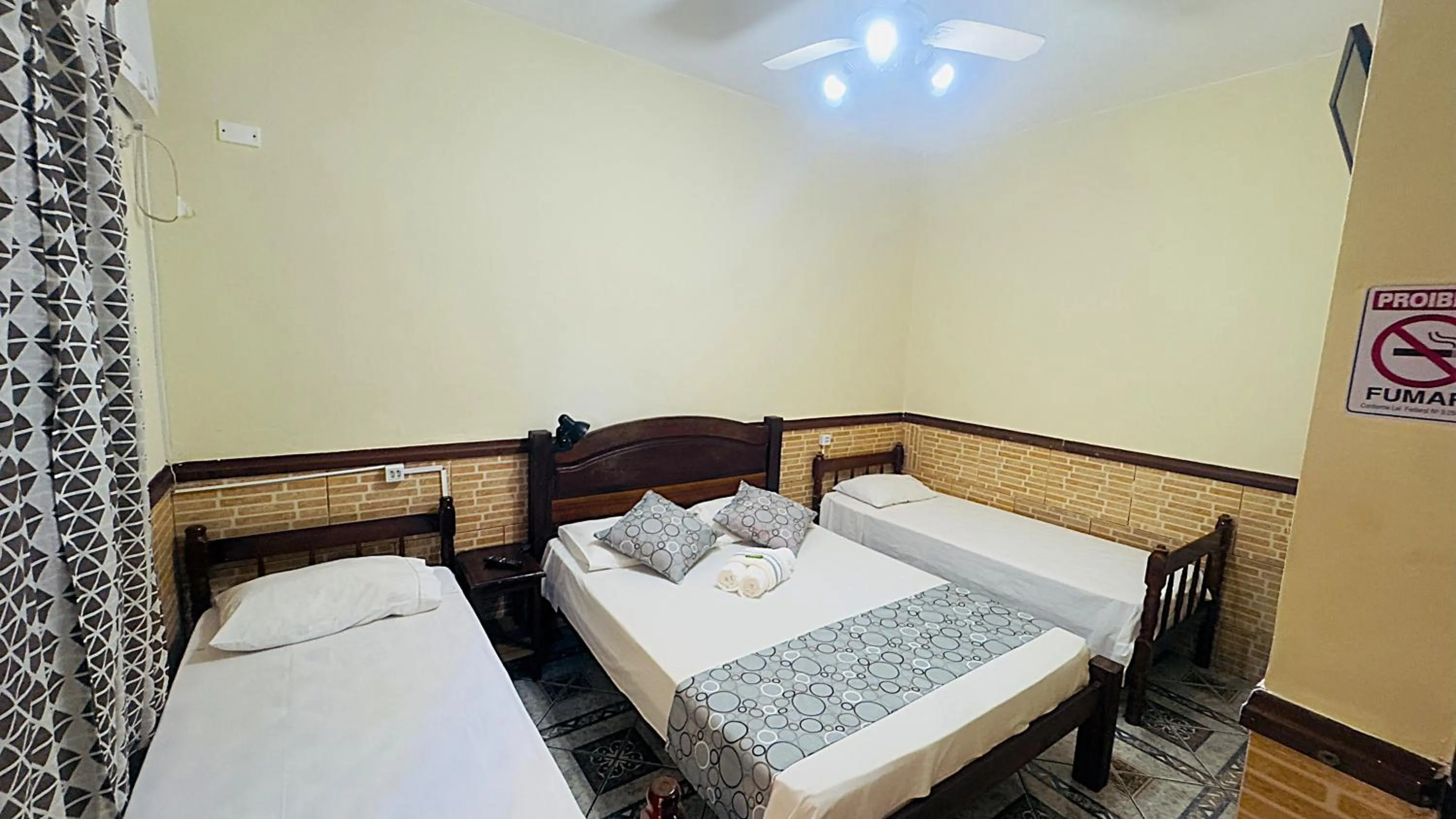 Bed in Pousada Parque Imperial no centro de Paraty