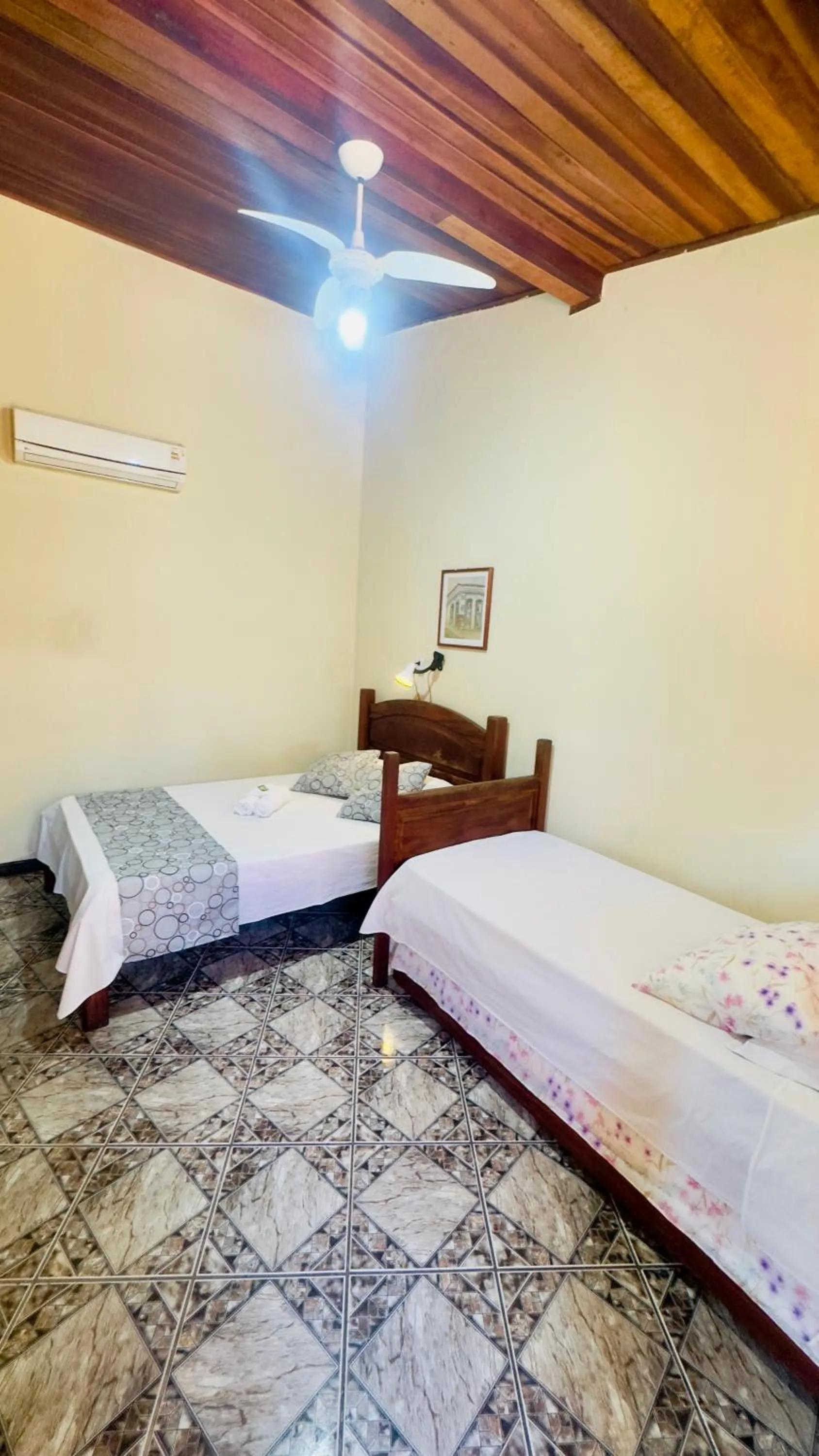 Bed in Pousada Parque Imperial no centro de Paraty