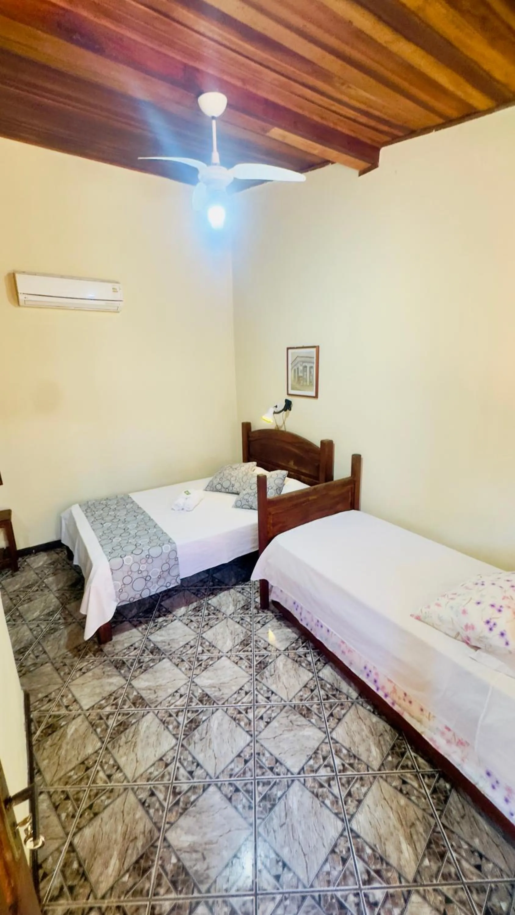 Bed in Pousada Parque Imperial no centro de Paraty