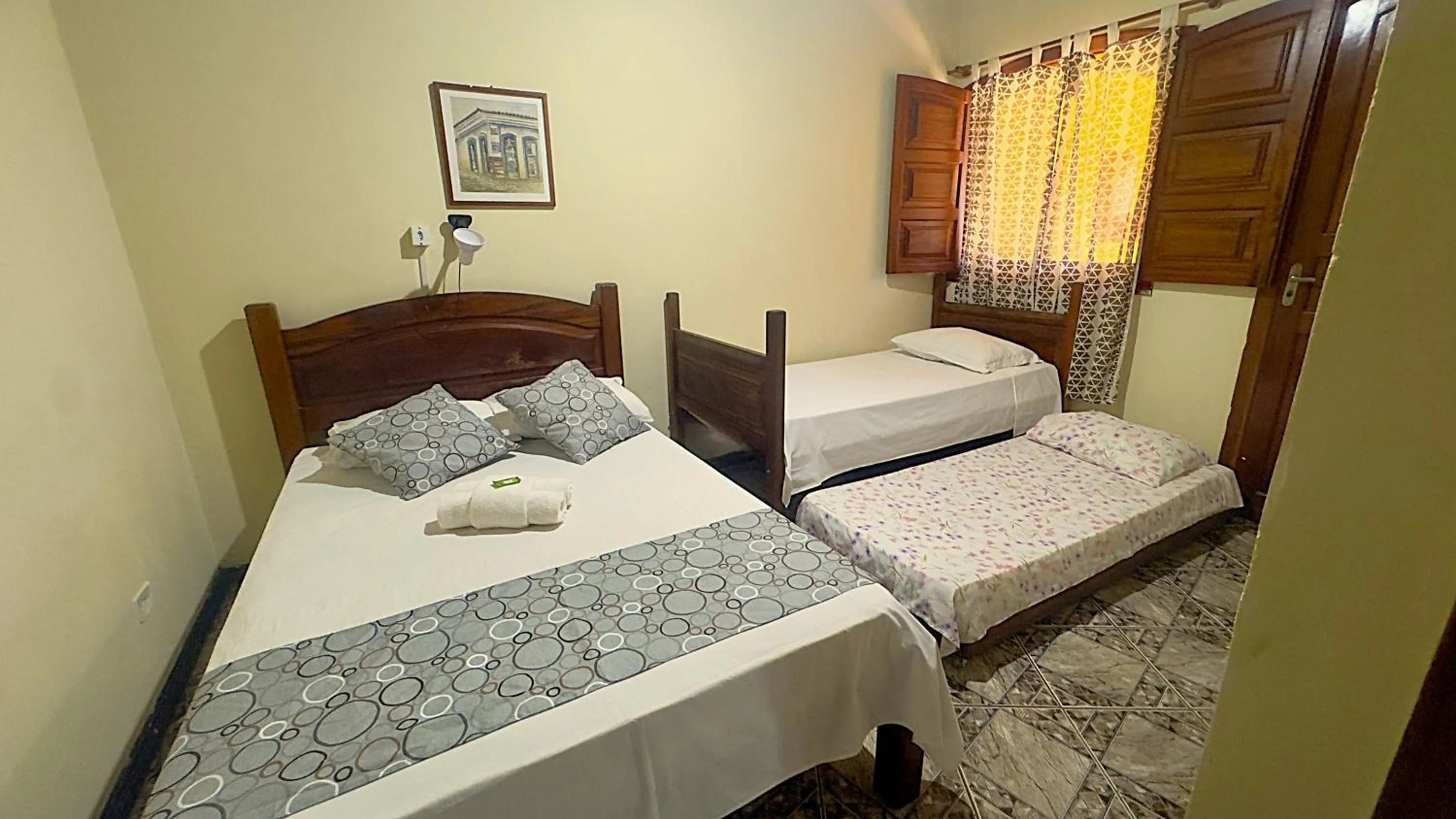 Bed in Pousada Parque Imperial no centro de Paraty