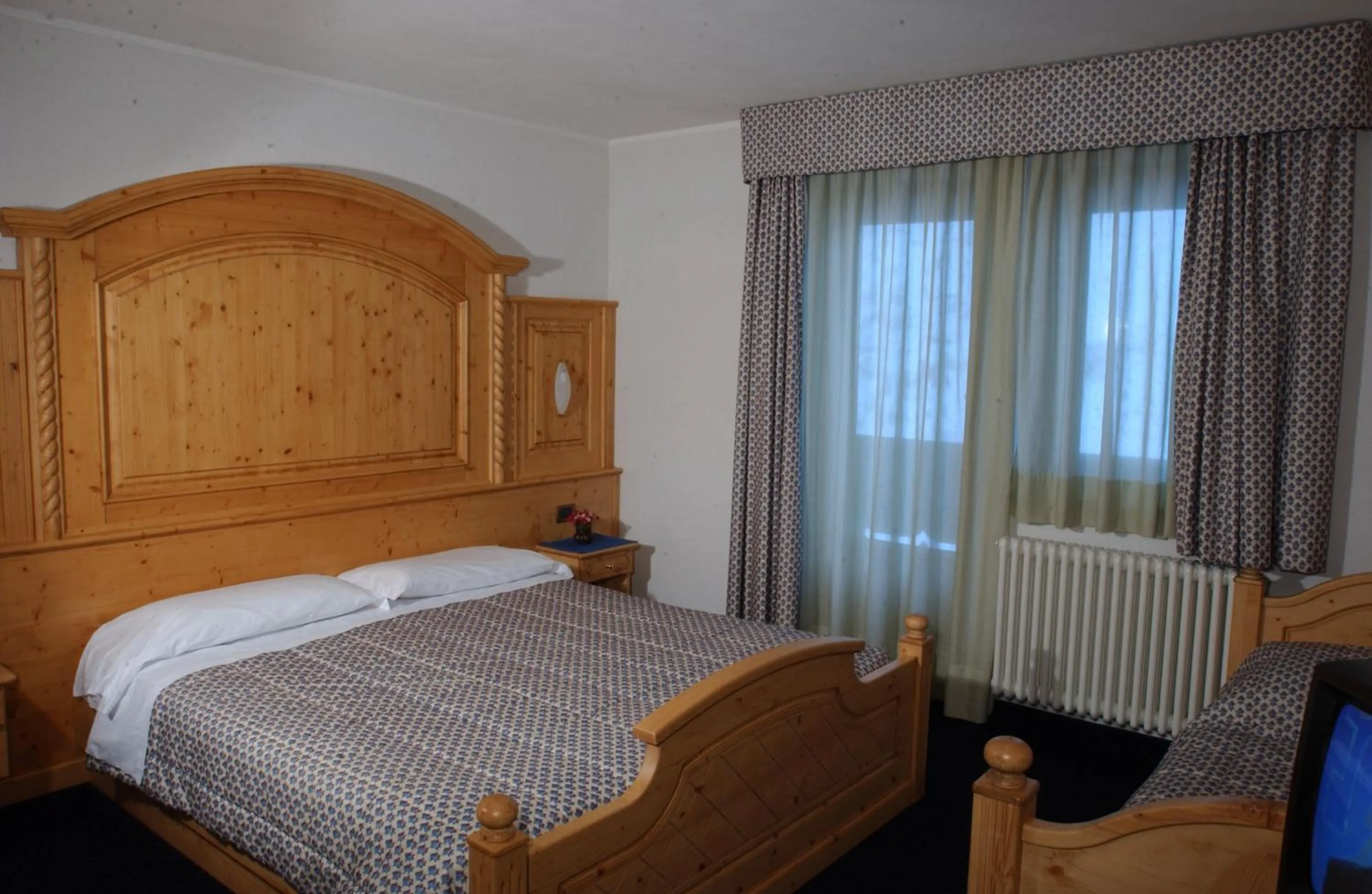 Bed in Sporting Hotel