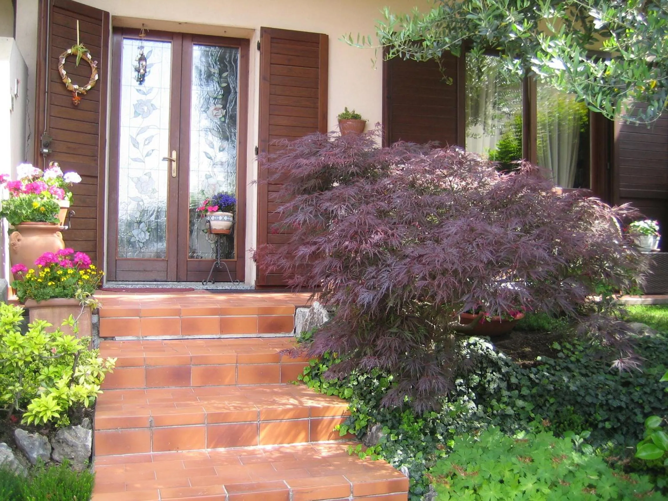 Facade/entrance in B&B Al Calicanto