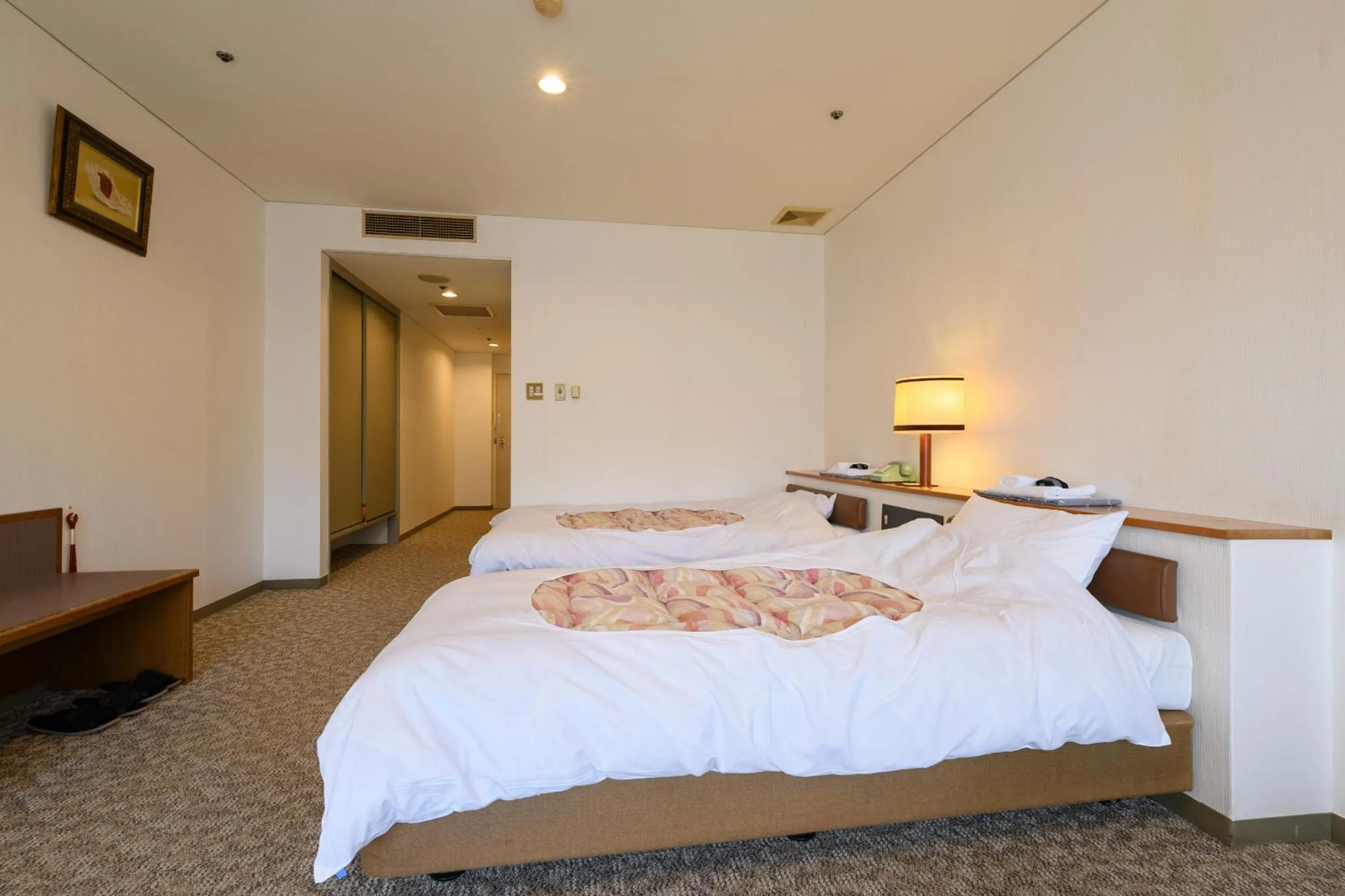 Bed in Hotel Tetora Resort Shizuoka Yaizu