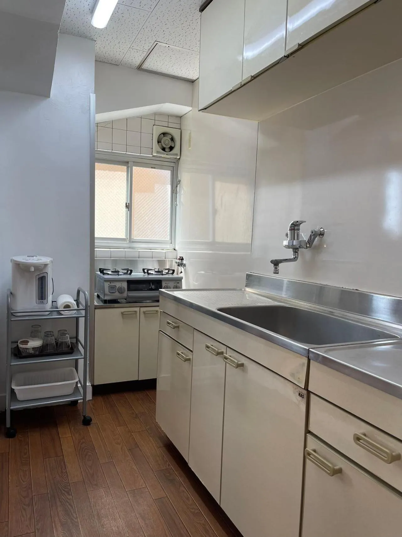 Kitchen or kitchenette in Sea View Court Kobe