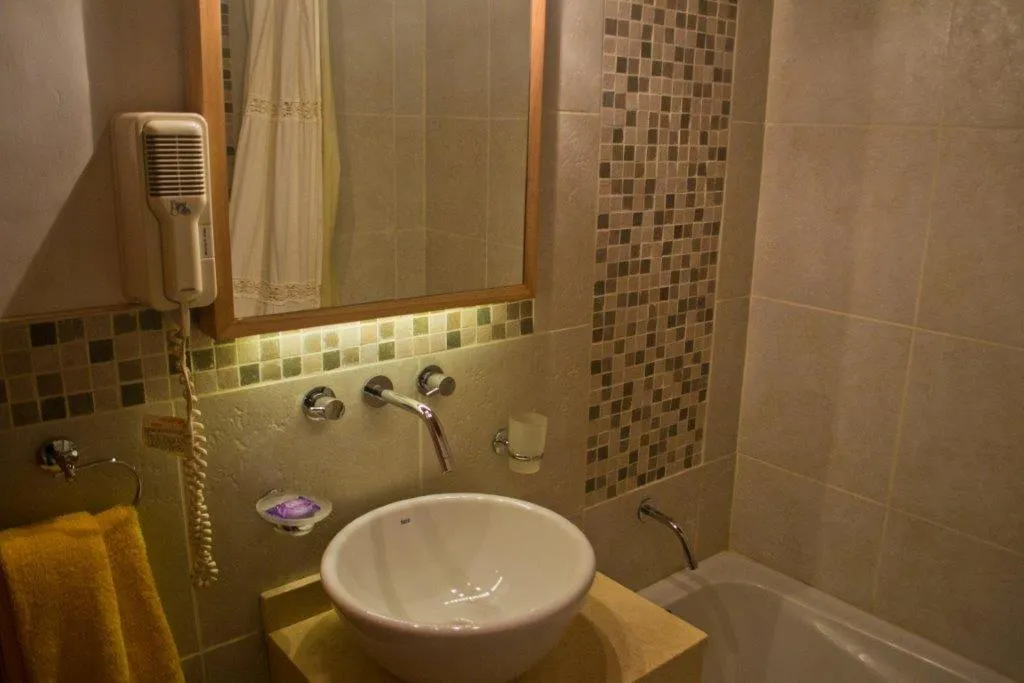 Bathroom in Hotel y Cabañas Le Village