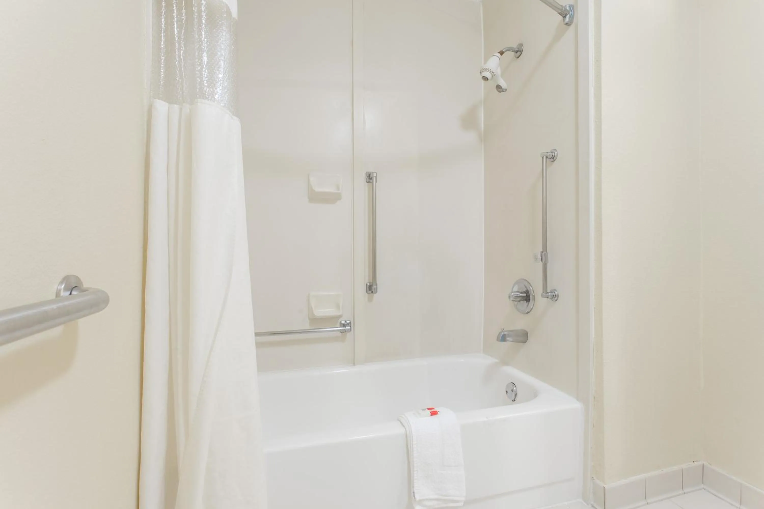 Bathroom in Days Inn by Wyndham Norfolk Airport