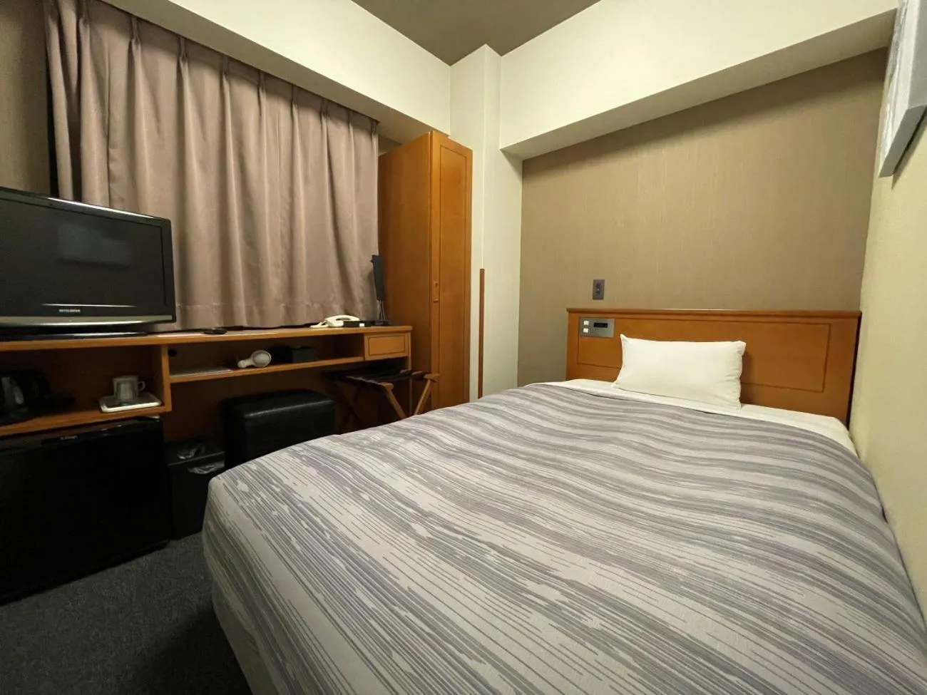Photo of the whole room, Bed in Hotel Route-Inn Asahikawa Ekimae Ichijodori