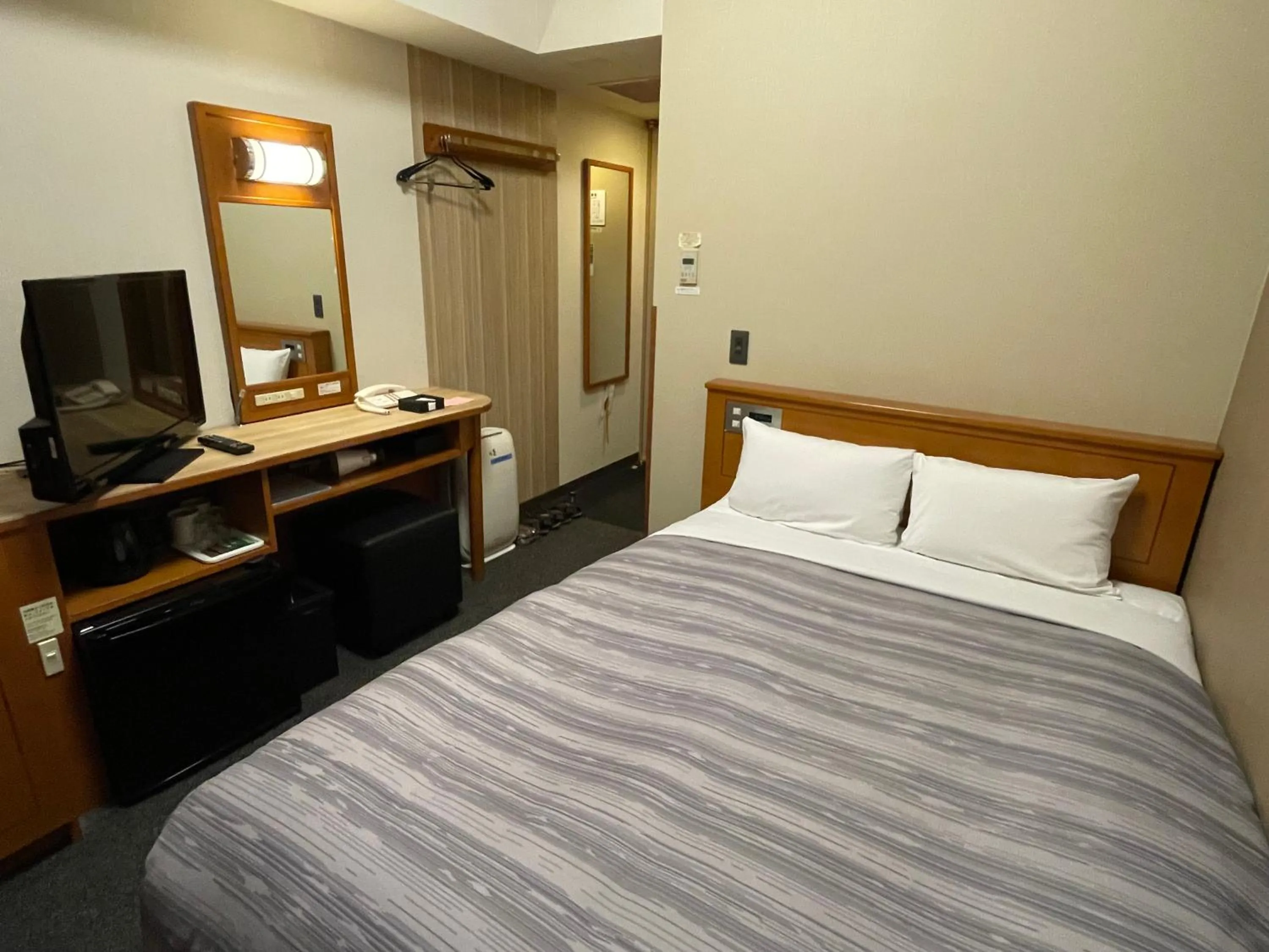 Photo of the whole room, Bed in Hotel Route-Inn Asahikawa Ekimae Ichijodori
