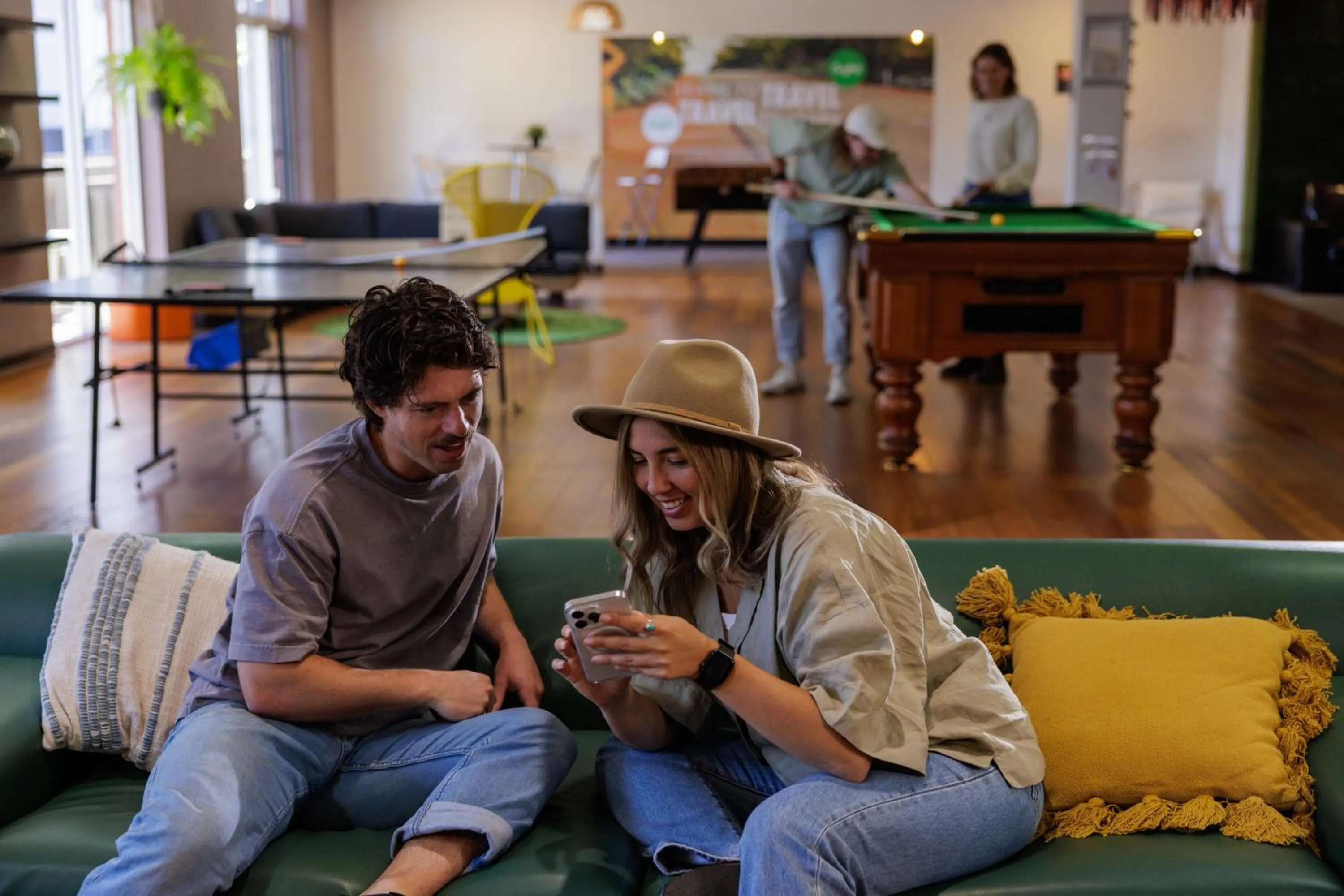 Communal lounge/ TV room in YHA Adelaide Central
