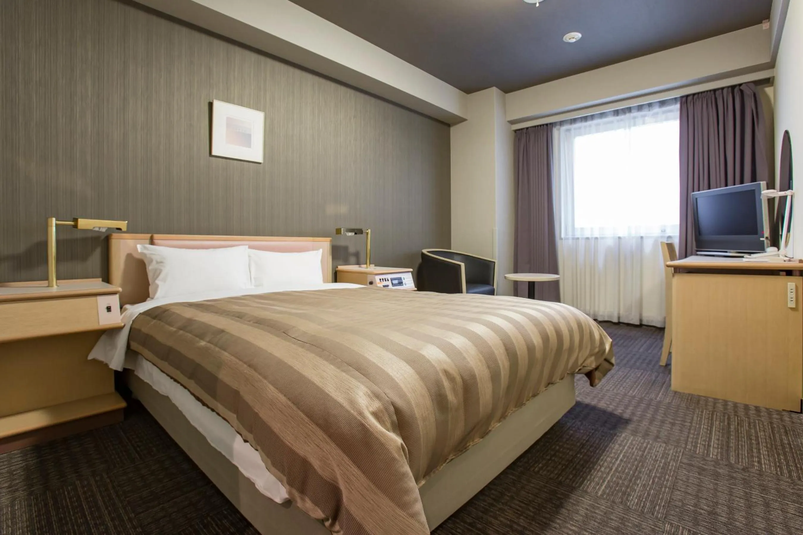 Photo of the whole room, Bed in Hotel Route-Inn Tokyo Ikebukuro