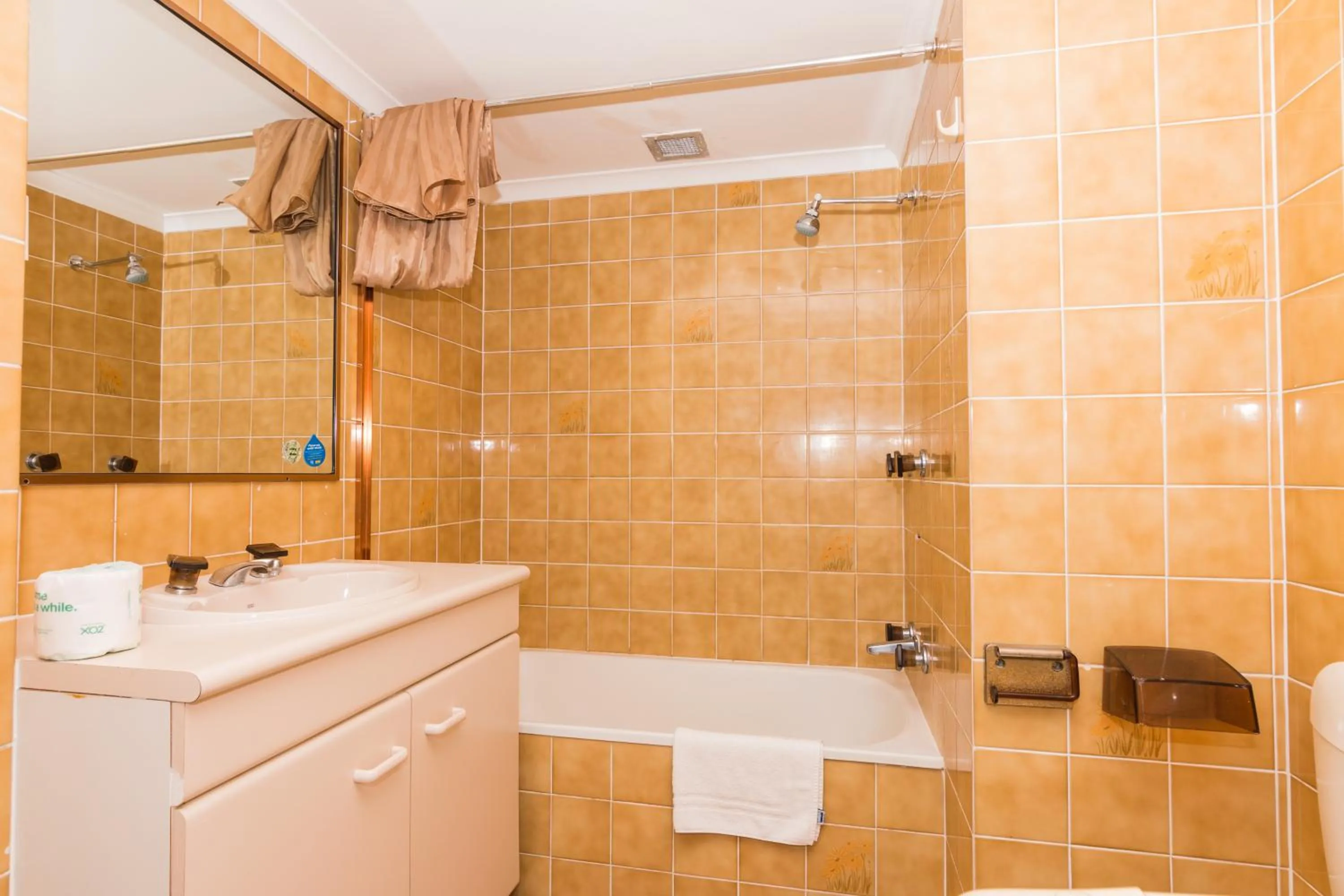 Bathroom in Beachcomber Resort - Official