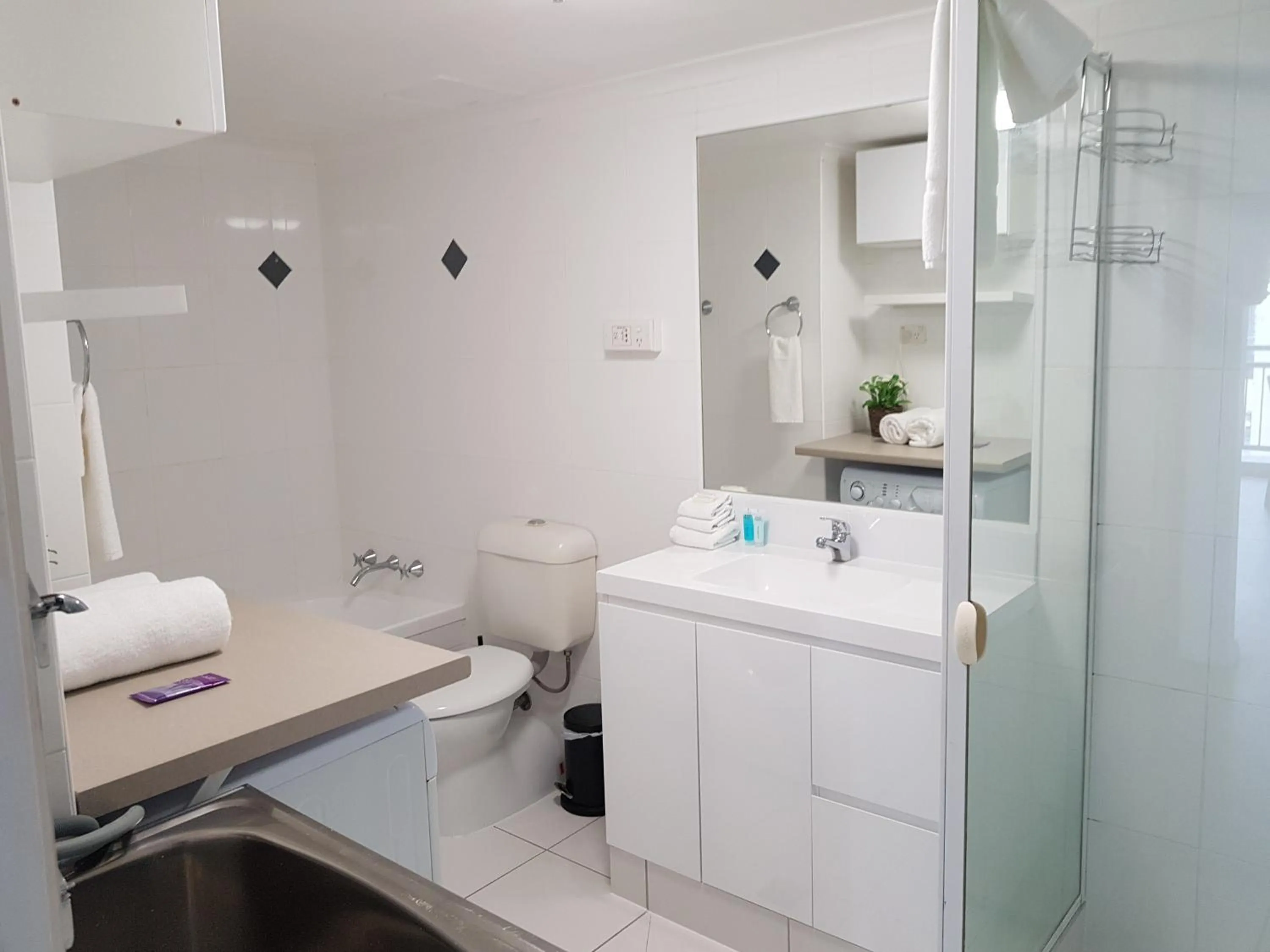 Bathroom in Beachcomber Resort - Official