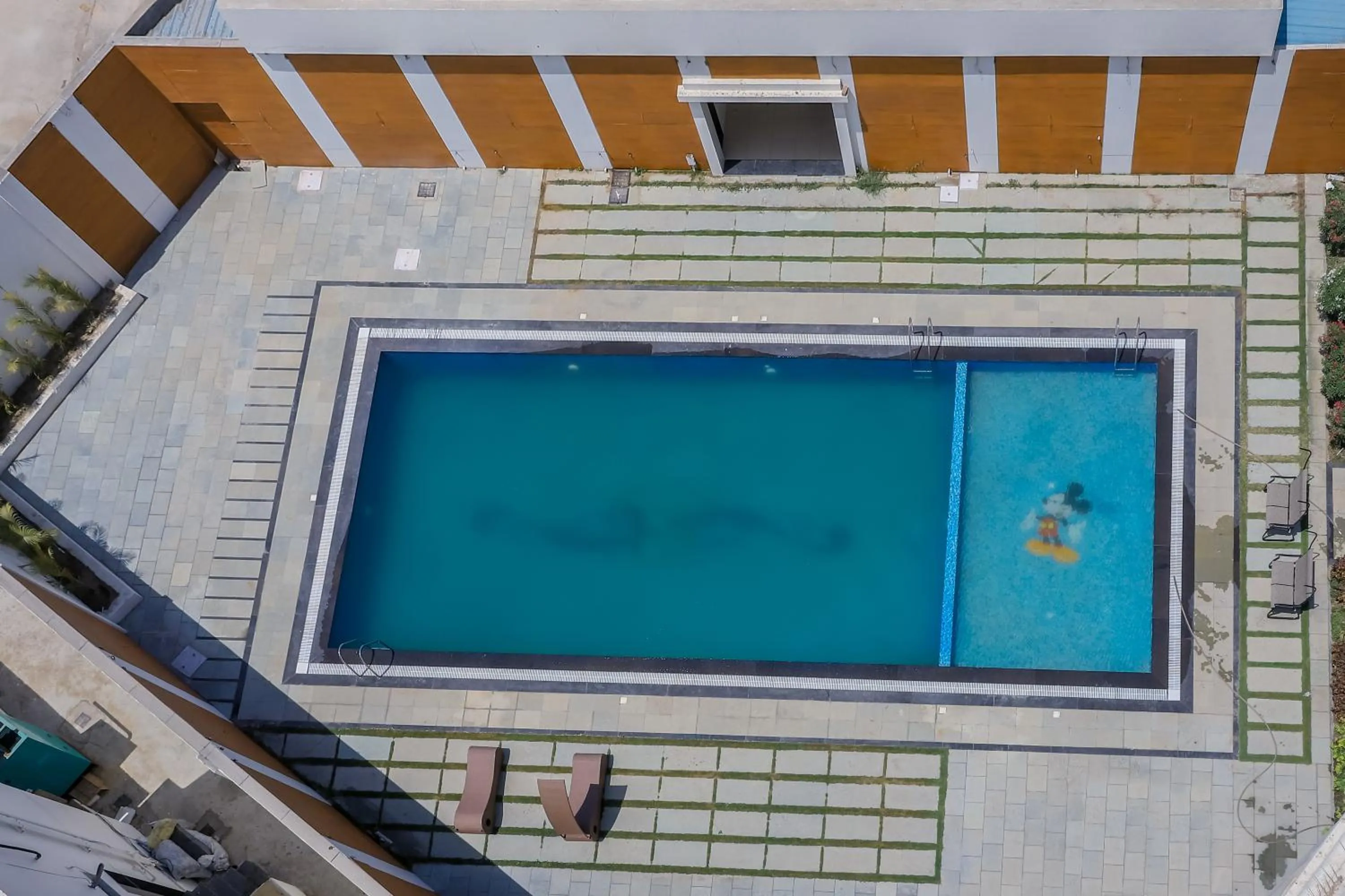 Swimming pool in Regenta Central Somnath, Bhalpara