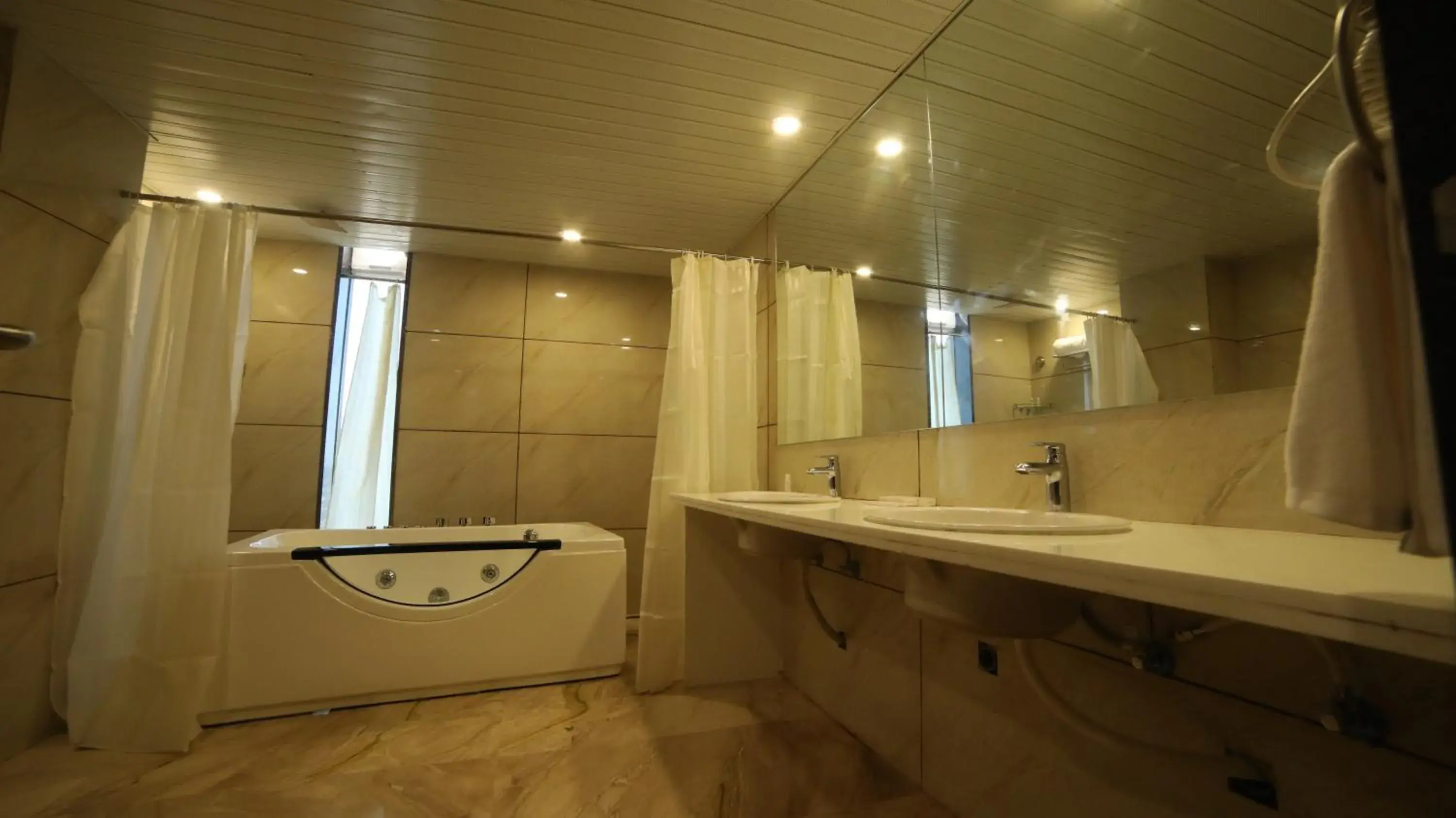 Bathroom in Regenta Central Somnath, Bhalpara Bathroom in Regenta Central Somnath, Bhalpara