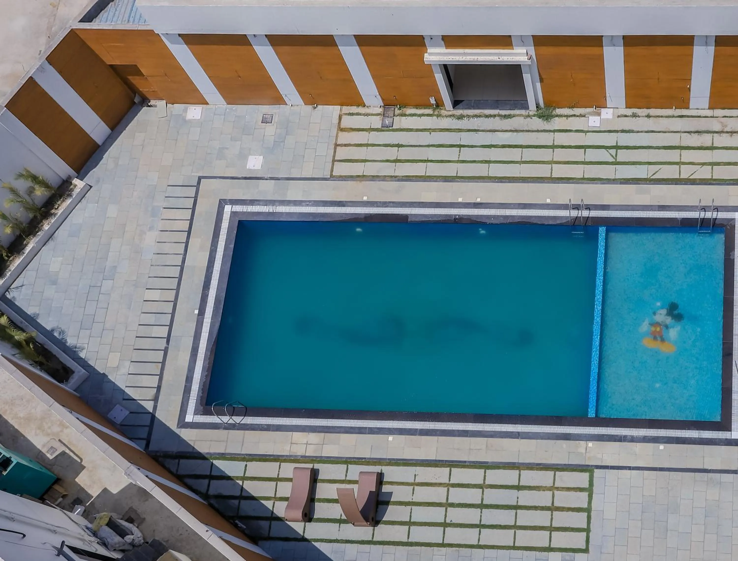 Swimming pool in Regenta Central Somnath, Bhalpara