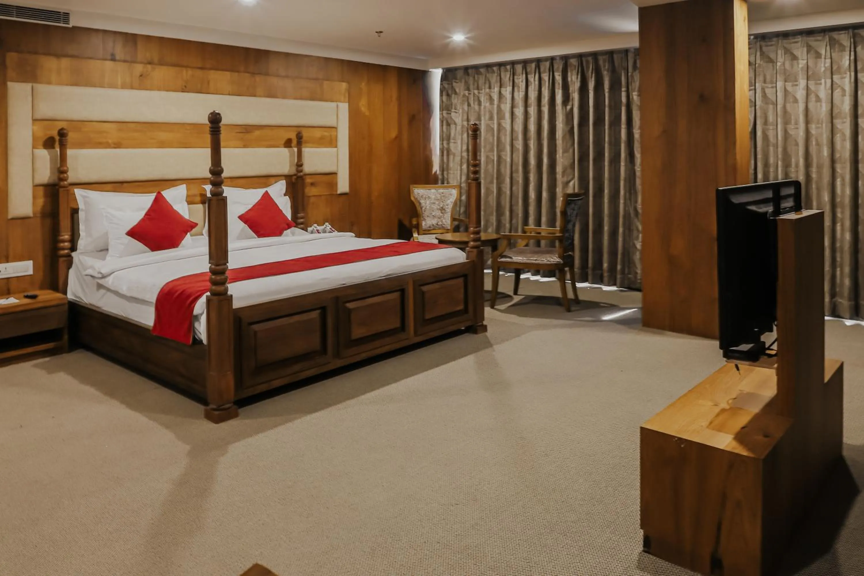 Bedroom, Bed in Regenta Central Somnath, Bhalpara