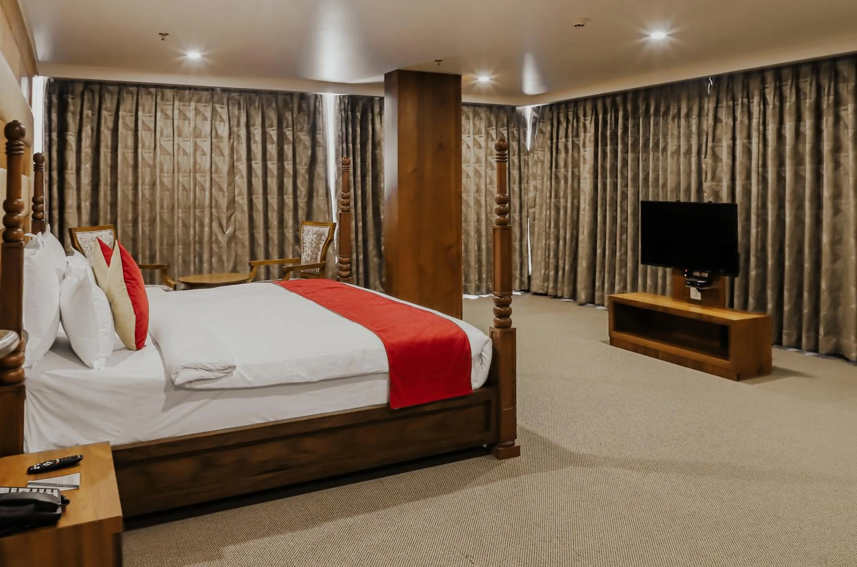 Bedroom, Bed in Regenta Central Somnath, Bhalpara