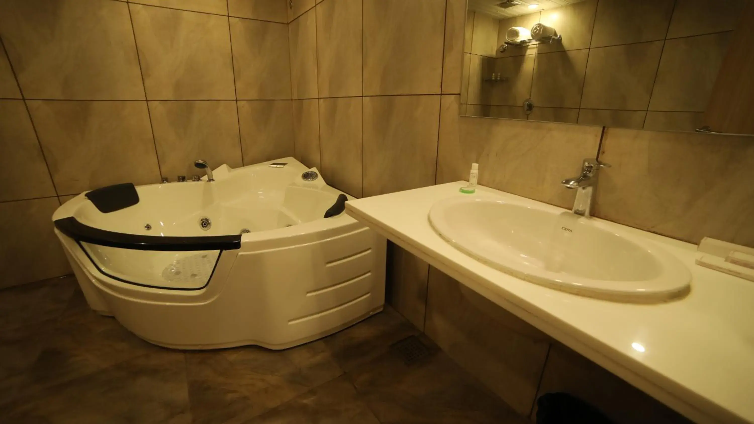 Bathroom in Regenta Central Somnath, Bhalpara Bathroom in Regenta Central Somnath, Bhalpara