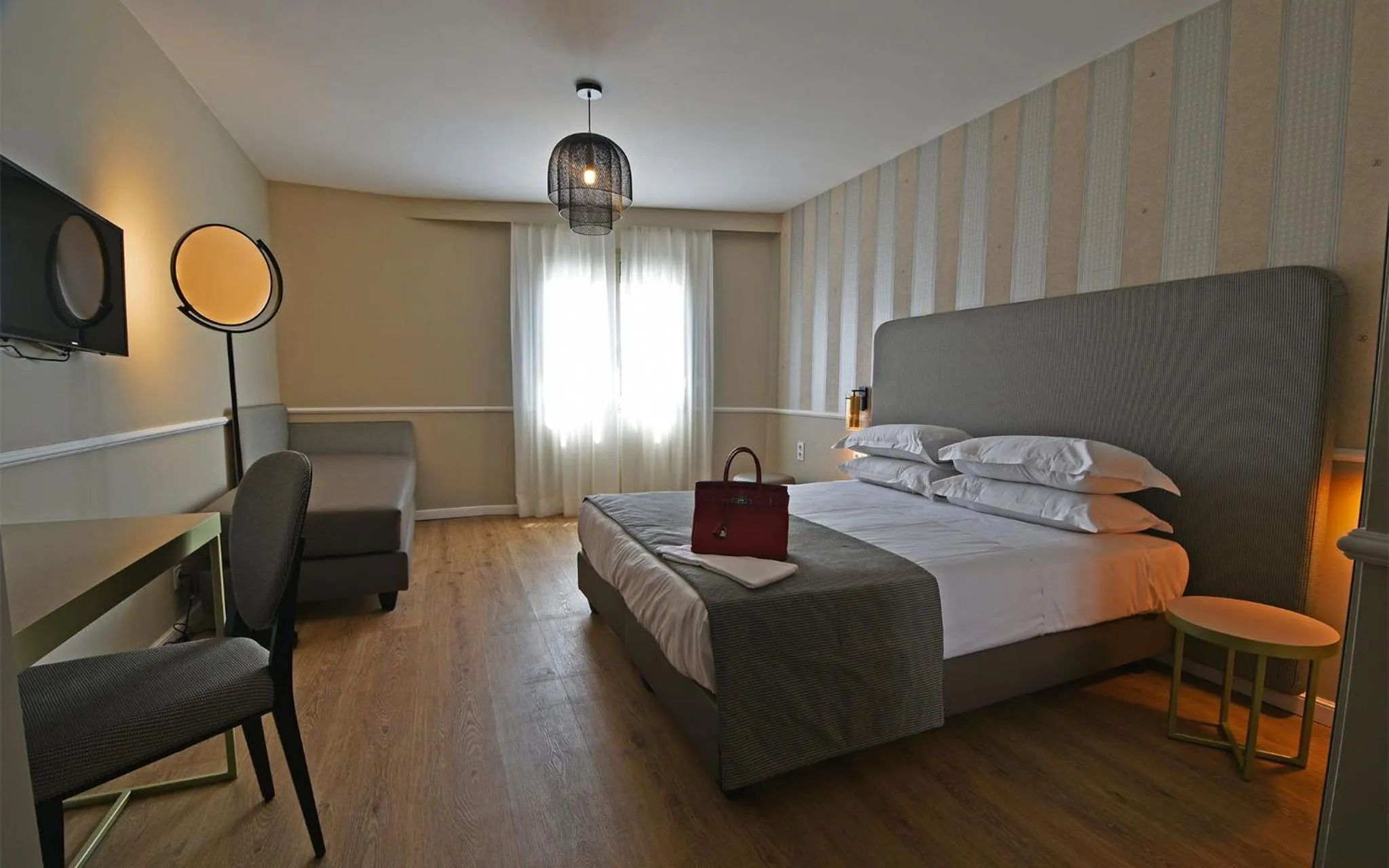 Decorative detail, Bed in Hotel Restaurant Christophe Colomb