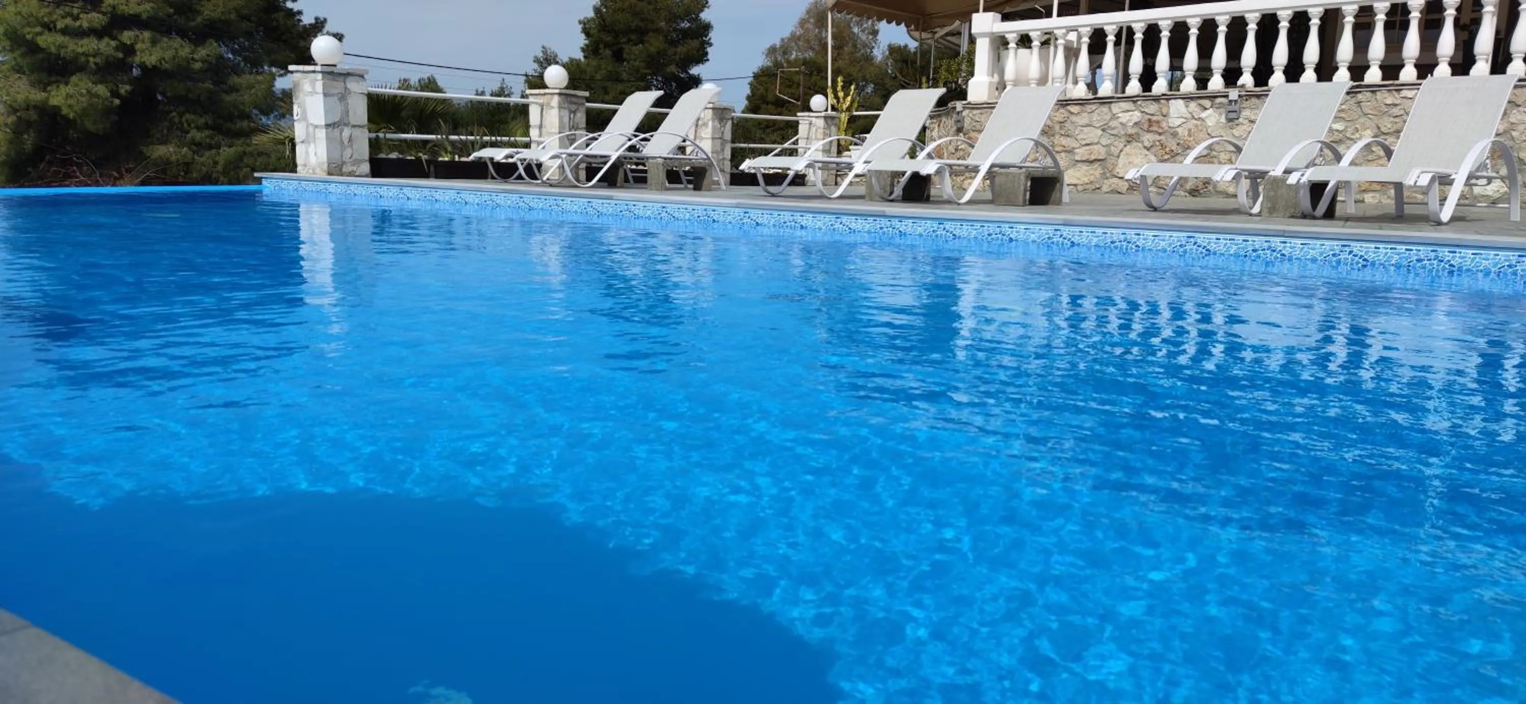 Swimming pool in Oskars Studios & Apartments