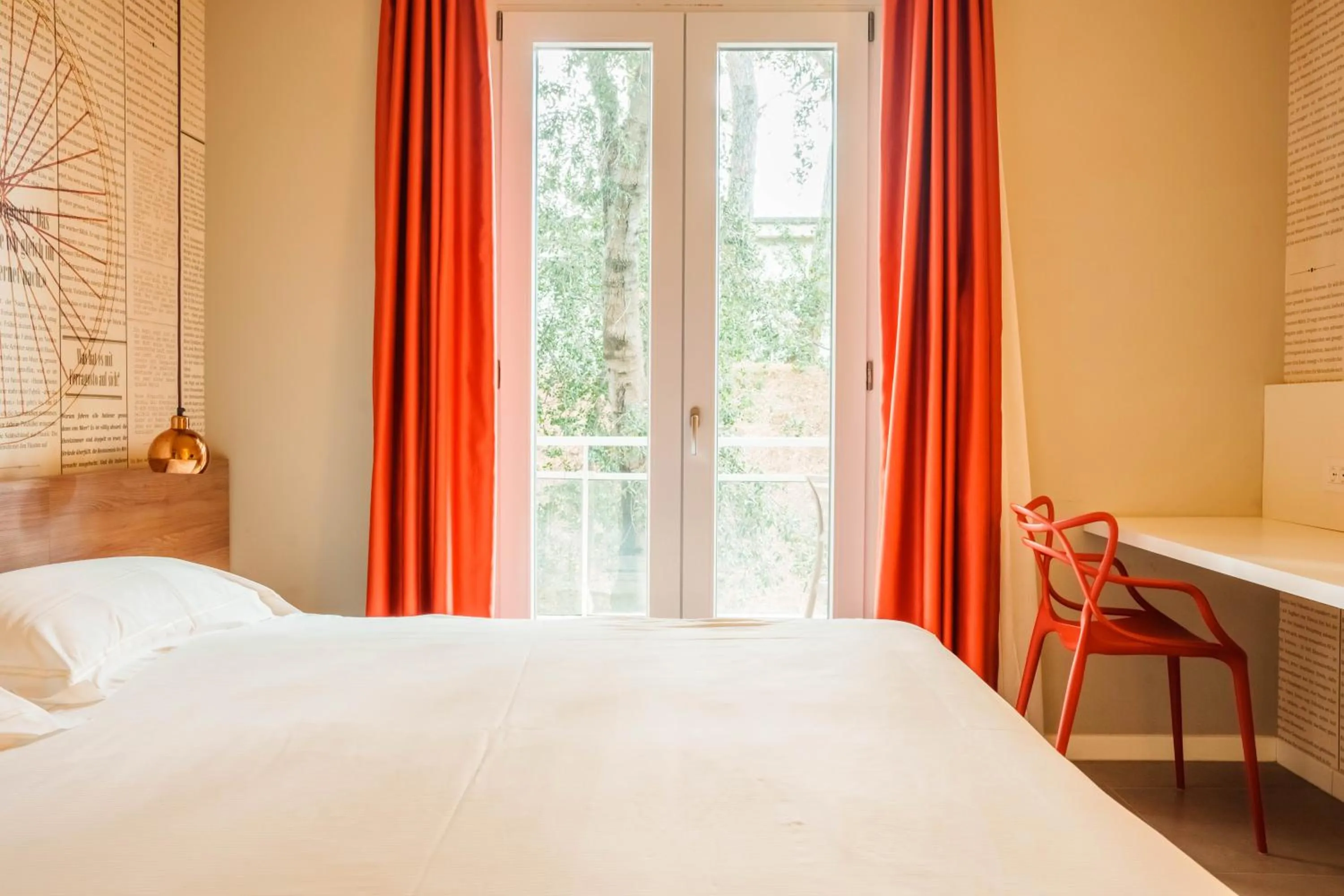 Bed in Golfo del Sole Hotel & Holiday Resort