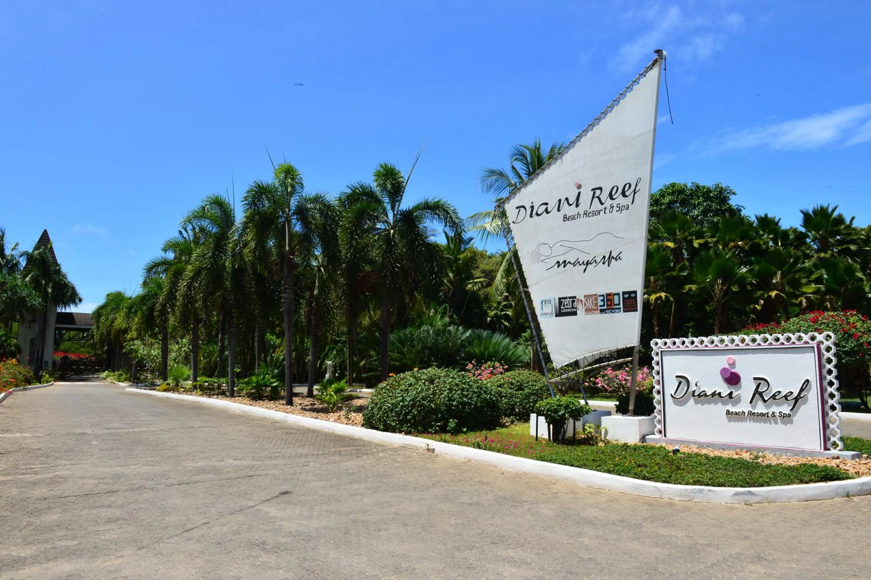 Property logo or sign in Diani Reef Beach Resort & Spa - Your Beachfront Bliss Awaits
