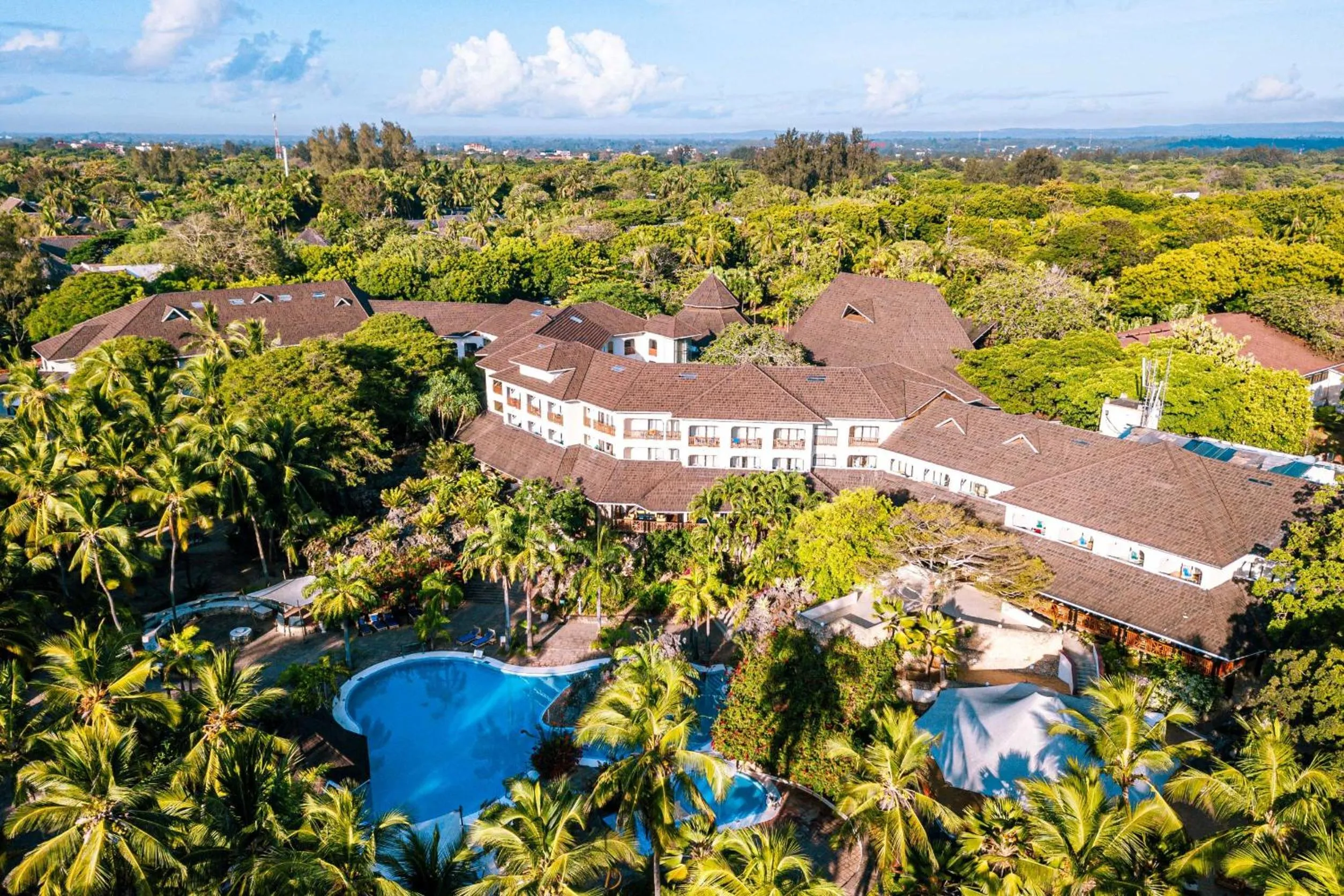 Property building in Diani Reef Beach Resort & Spa - Your Beachfront Bliss Awaits