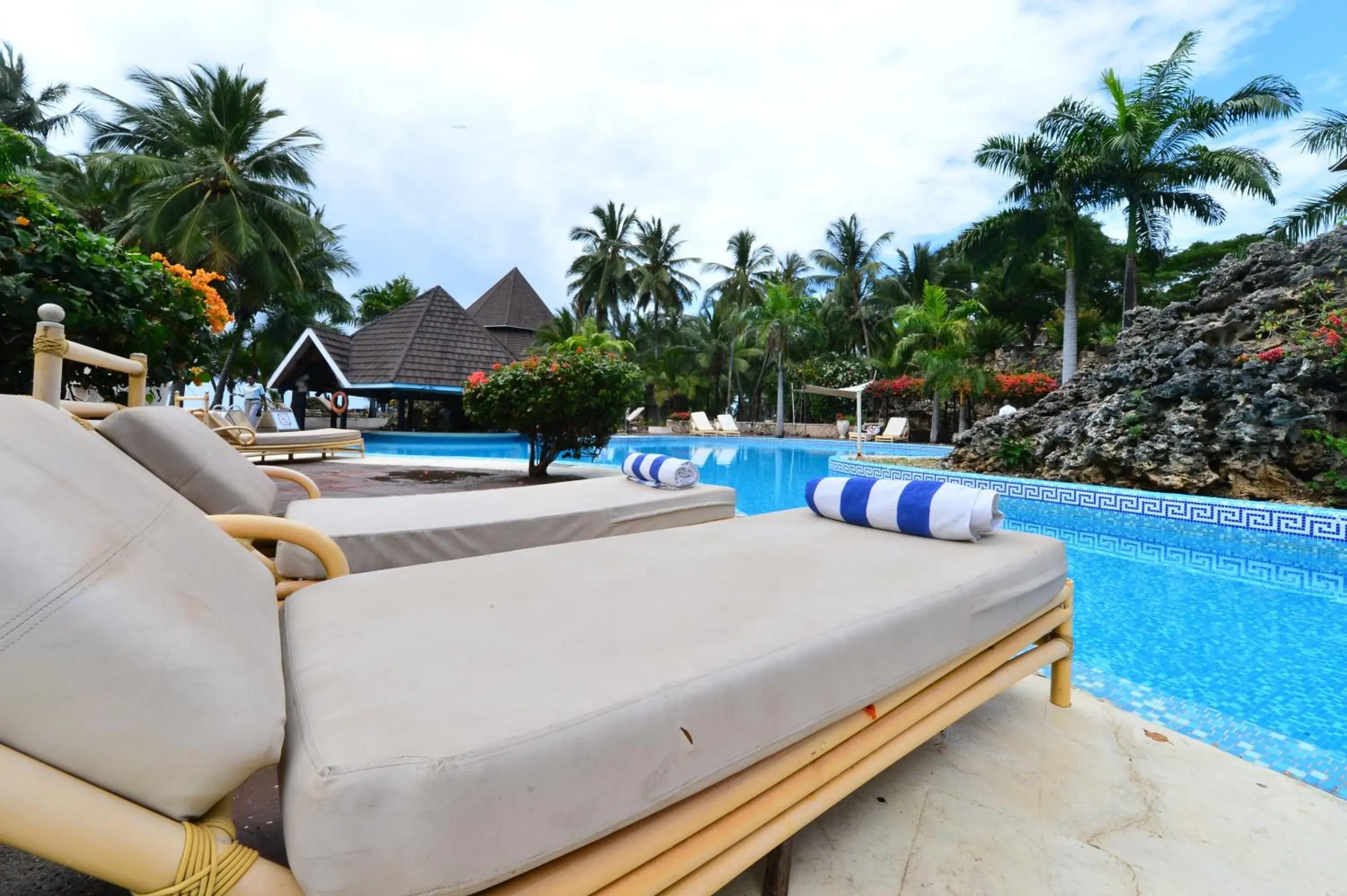 Swimming pool in Diani Reef Beach Resort & Spa - Your Beachfront Bliss Awaits Swimming pool in Diani Reef Beach Resort & Spa - Your Beachfront Bliss Awaits