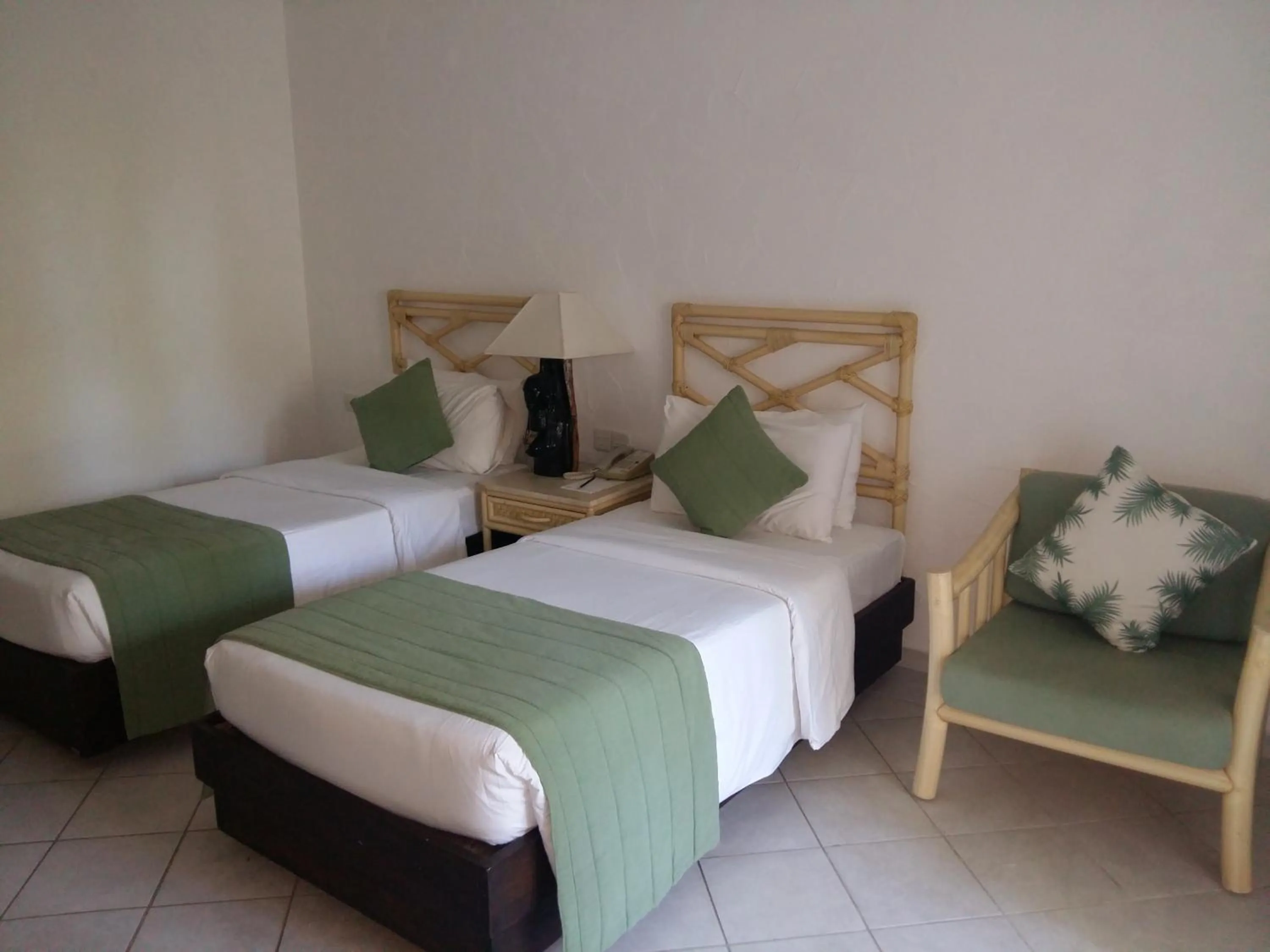 Bed in Diani Reef Beach Resort & Spa - Your Beachfront Bliss Awaits