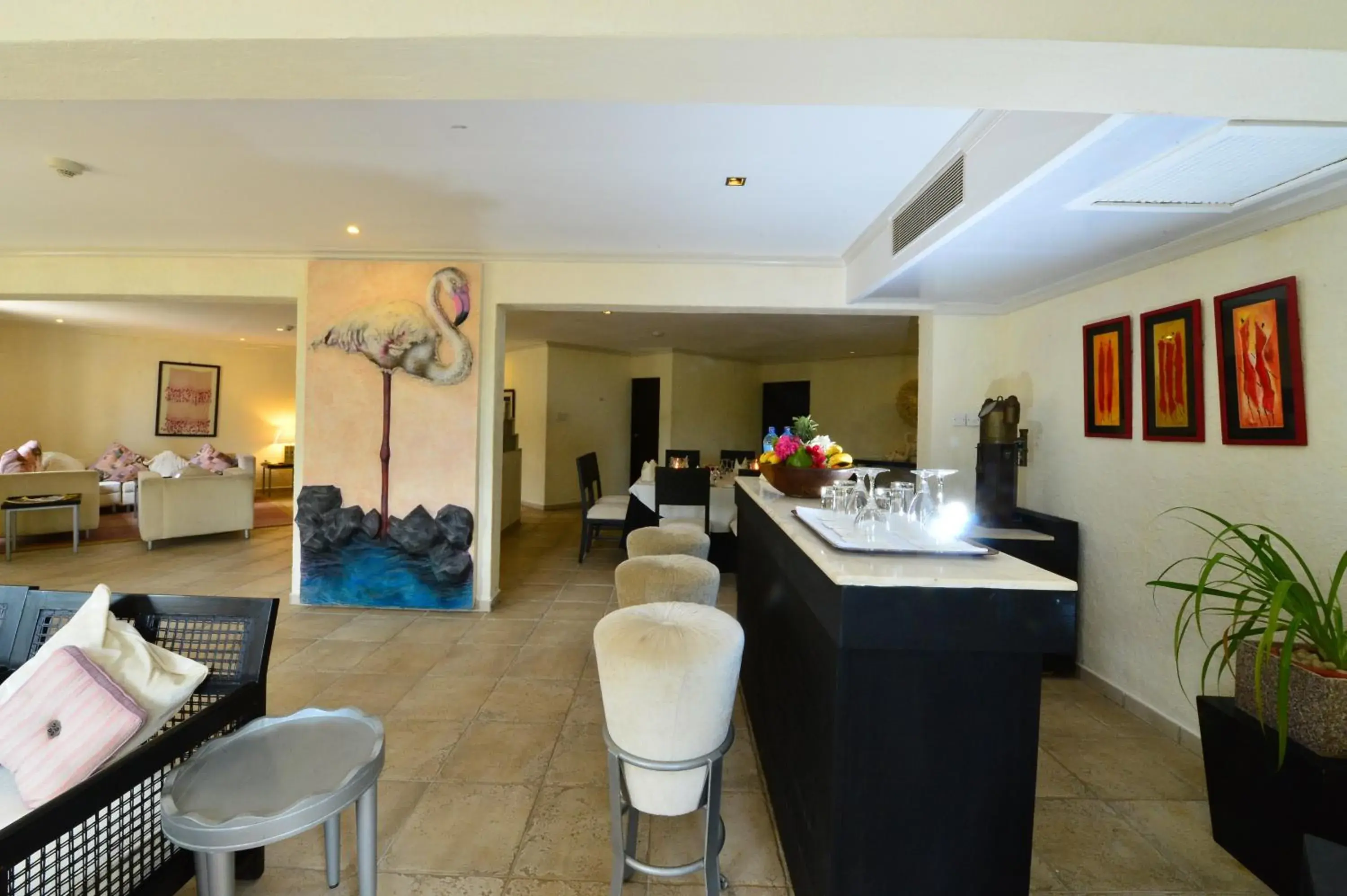 Lounge or bar in Diani Reef Beach Resort & Spa - Your Beachfront Bliss Awaits Lounge or bar in Diani Reef Beach Resort & Spa - Your Beachfront Bliss Awaits