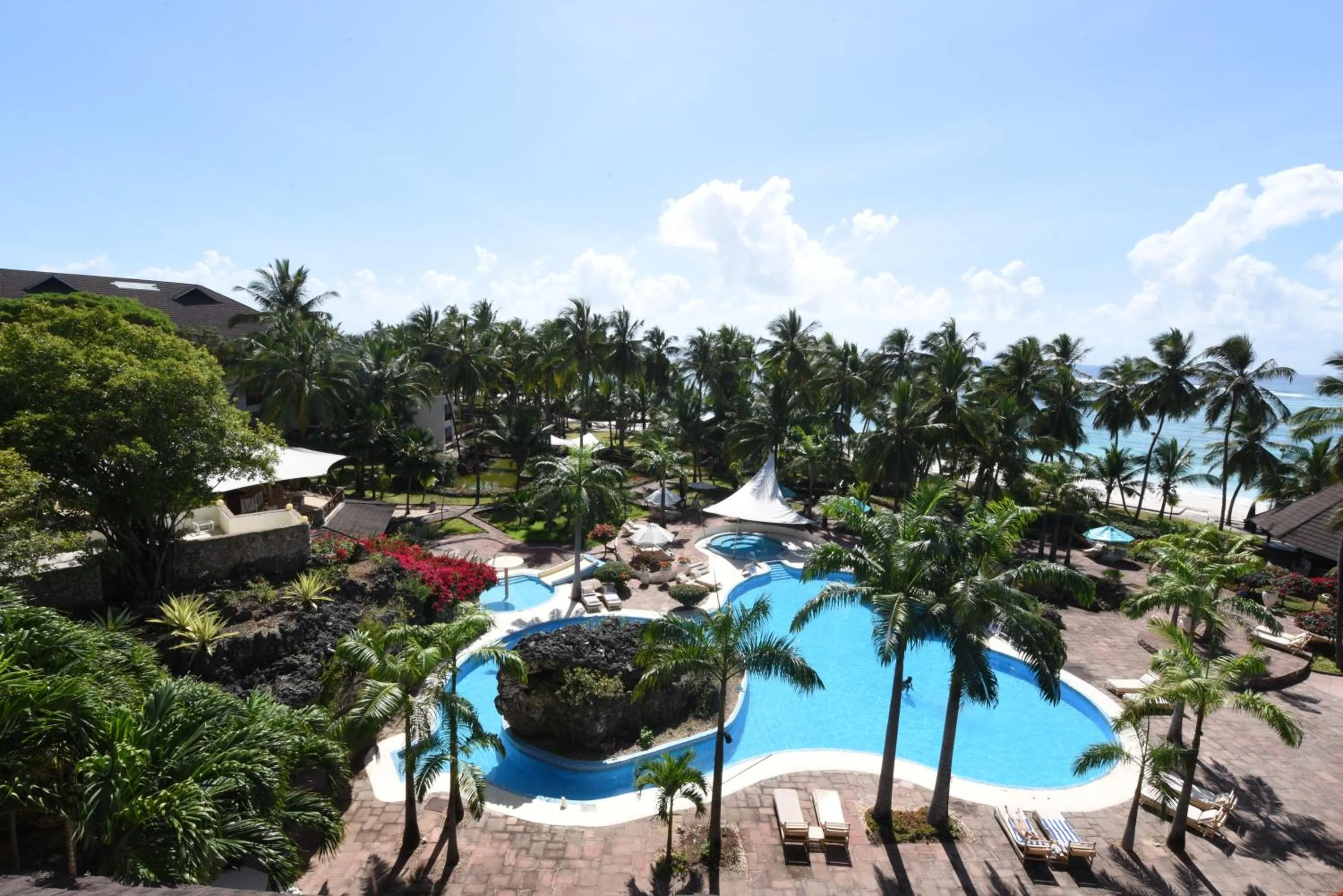 Pool view in Diani Reef Beach Resort & Spa - Your Beachfront Bliss Awaits