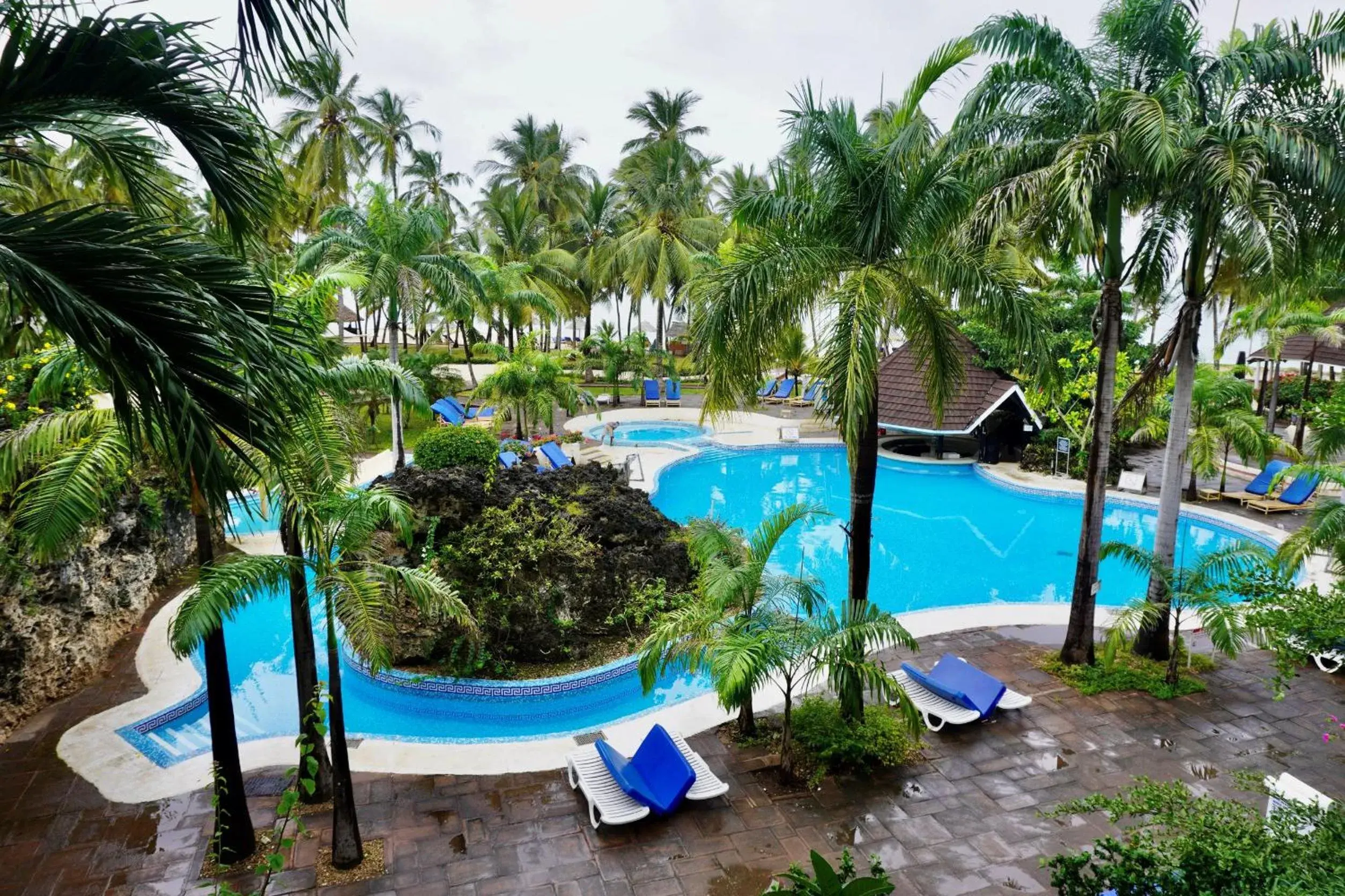 Pool view in Diani Reef Beach Resort & Spa - Your Beachfront Bliss Awaits Pool view in Diani Reef Beach Resort & Spa - Your Beachfront Bliss Awaits