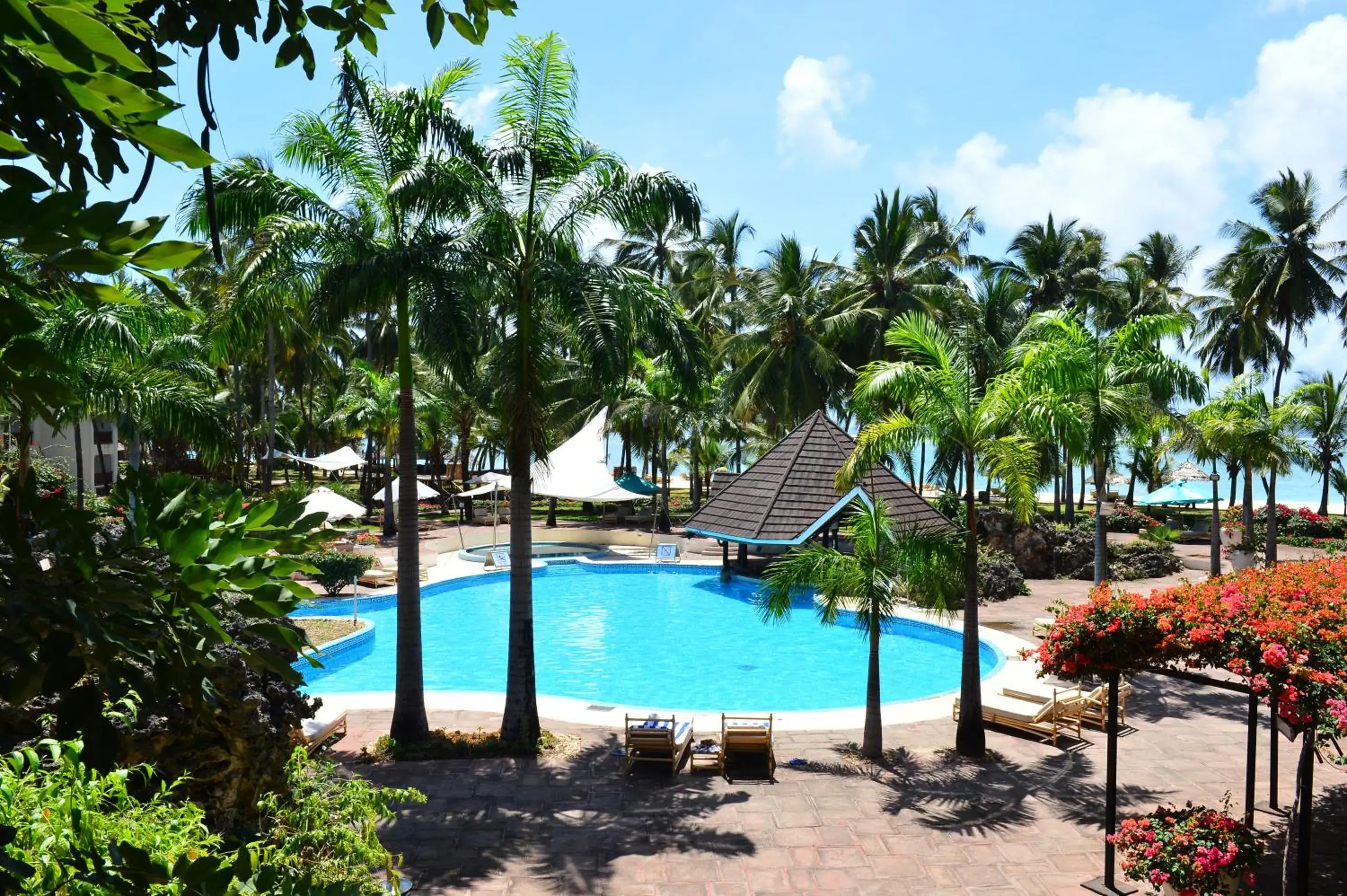 Swimming pool in Diani Reef Beach Resort & Spa - Your Beachfront Bliss Awaits Swimming pool in Diani Reef Beach Resort & Spa - Your Beachfront Bliss Awaits