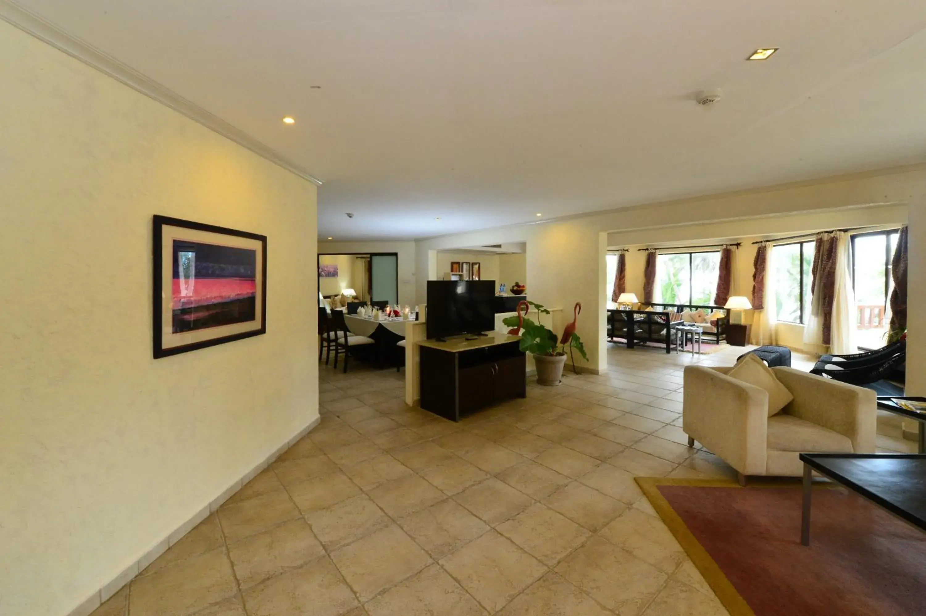 Living room in Diani Reef Beach Resort & Spa - Your Beachfront Bliss Awaits Living room in Diani Reef Beach Resort & Spa - Your Beachfront Bliss Awaits