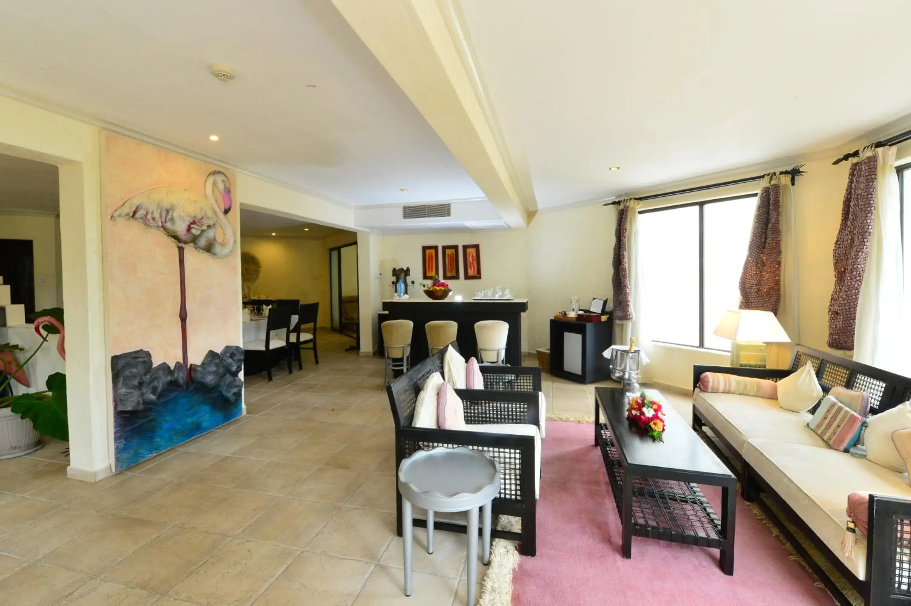 Living room in Diani Reef Beach Resort & Spa - Your Beachfront Bliss Awaits Living room in Diani Reef Beach Resort & Spa - Your Beachfront Bliss Awaits