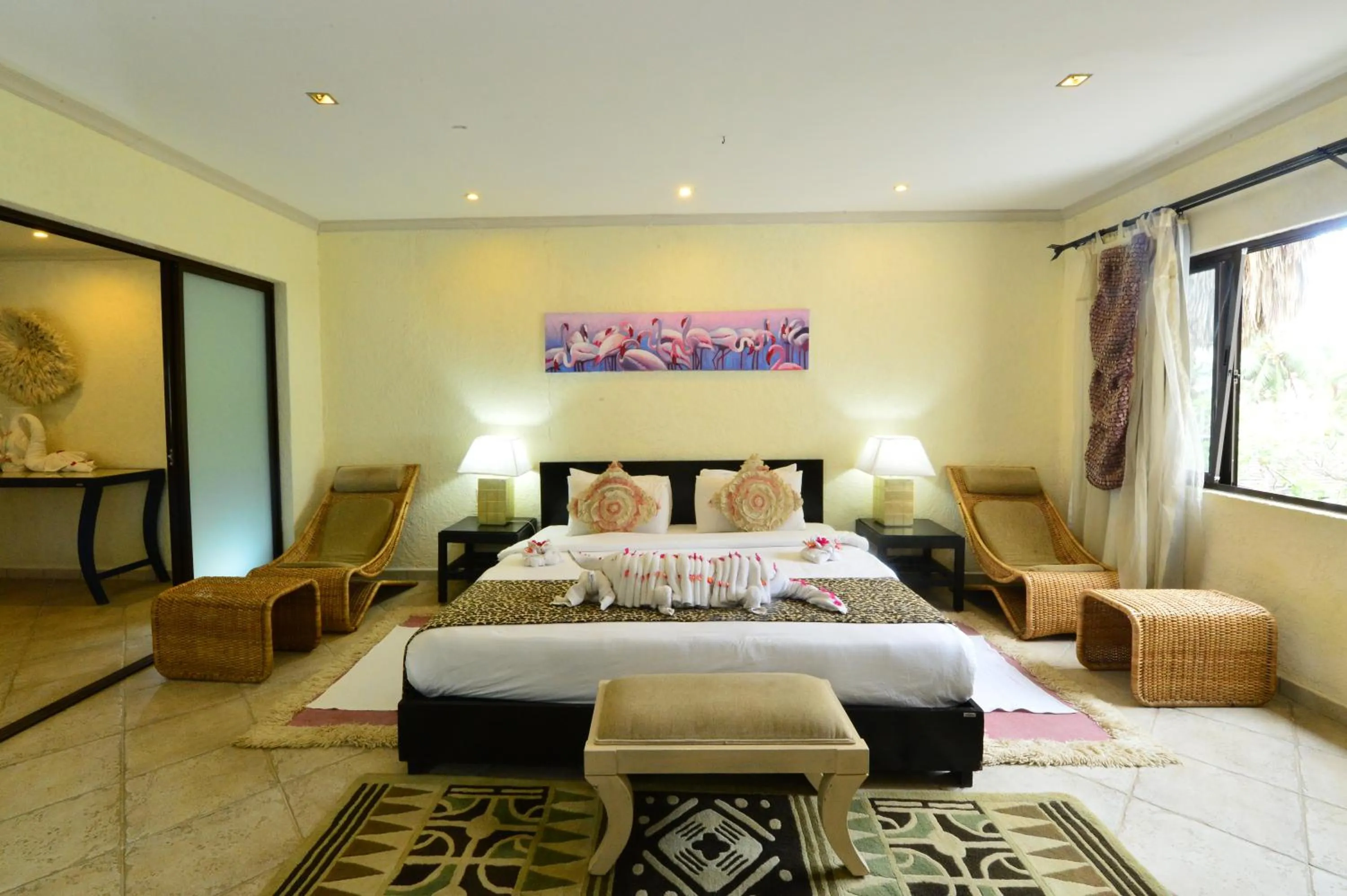 Bedroom, Bed in Diani Reef Beach Resort & Spa - Your Beachfront Bliss Awaits