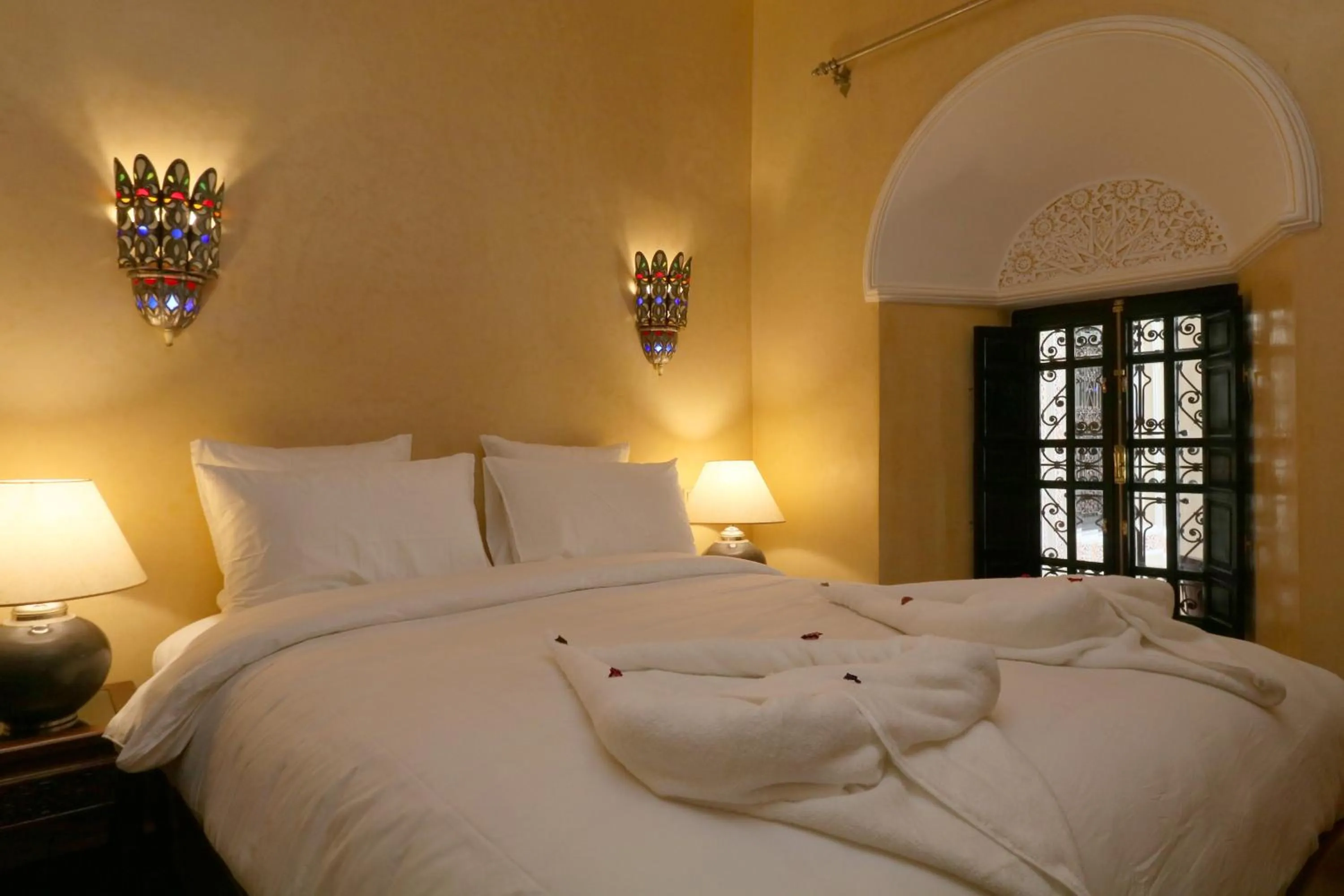 Bed in Riad Omara al Kasbah