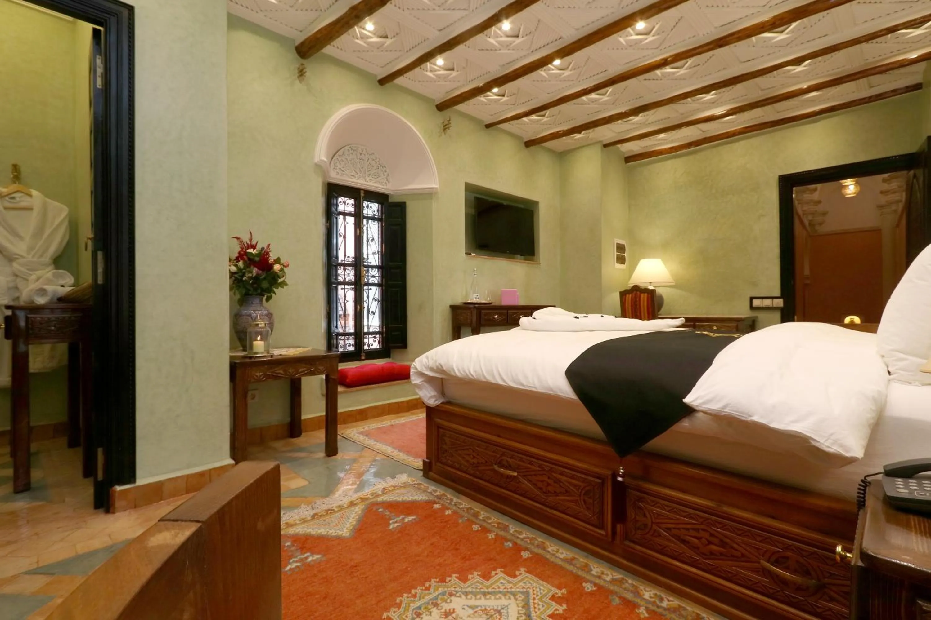 Bed in Riad Omara al Kasbah