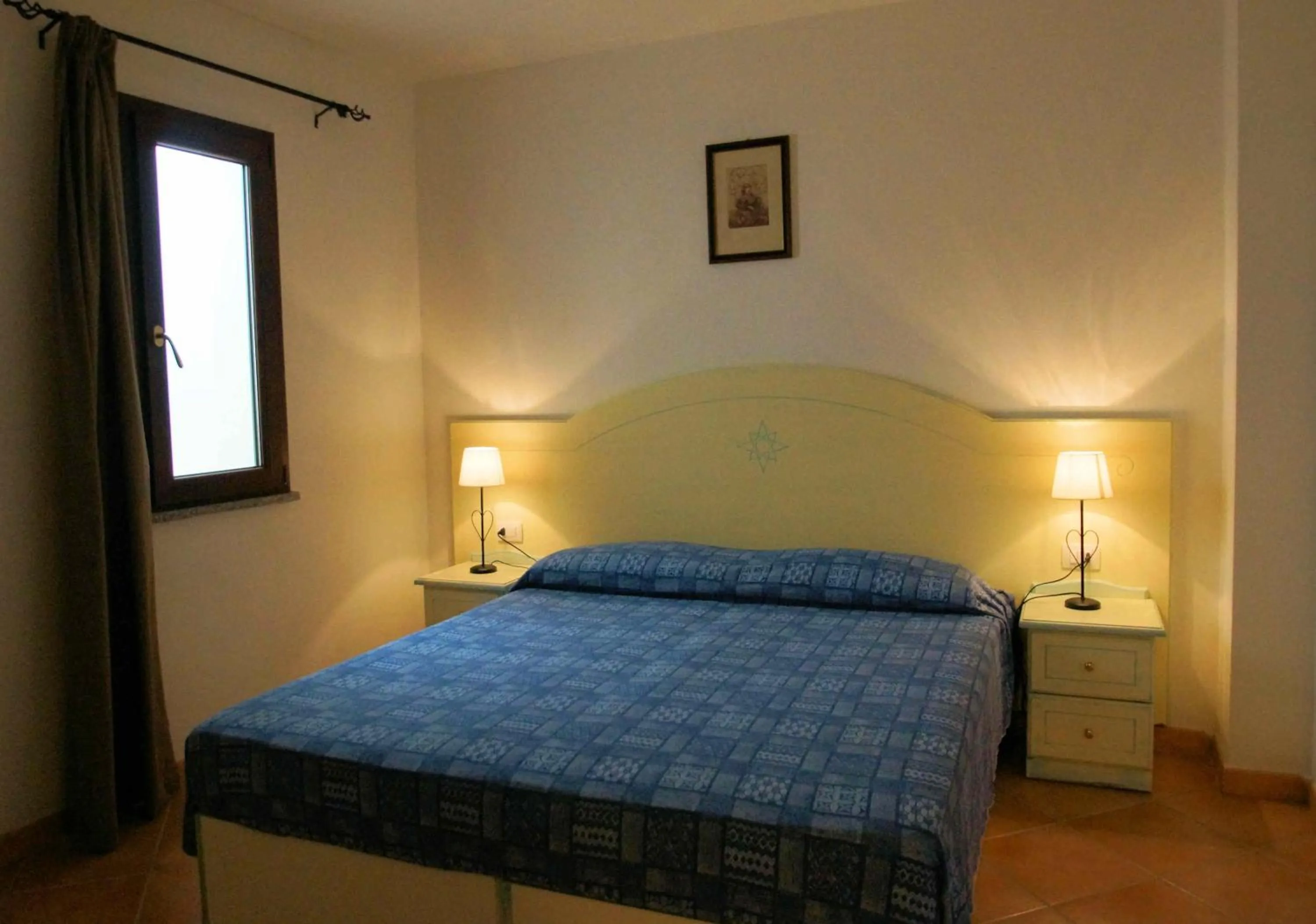 Bedroom, Bed in Sa Fiorida Appartamenti