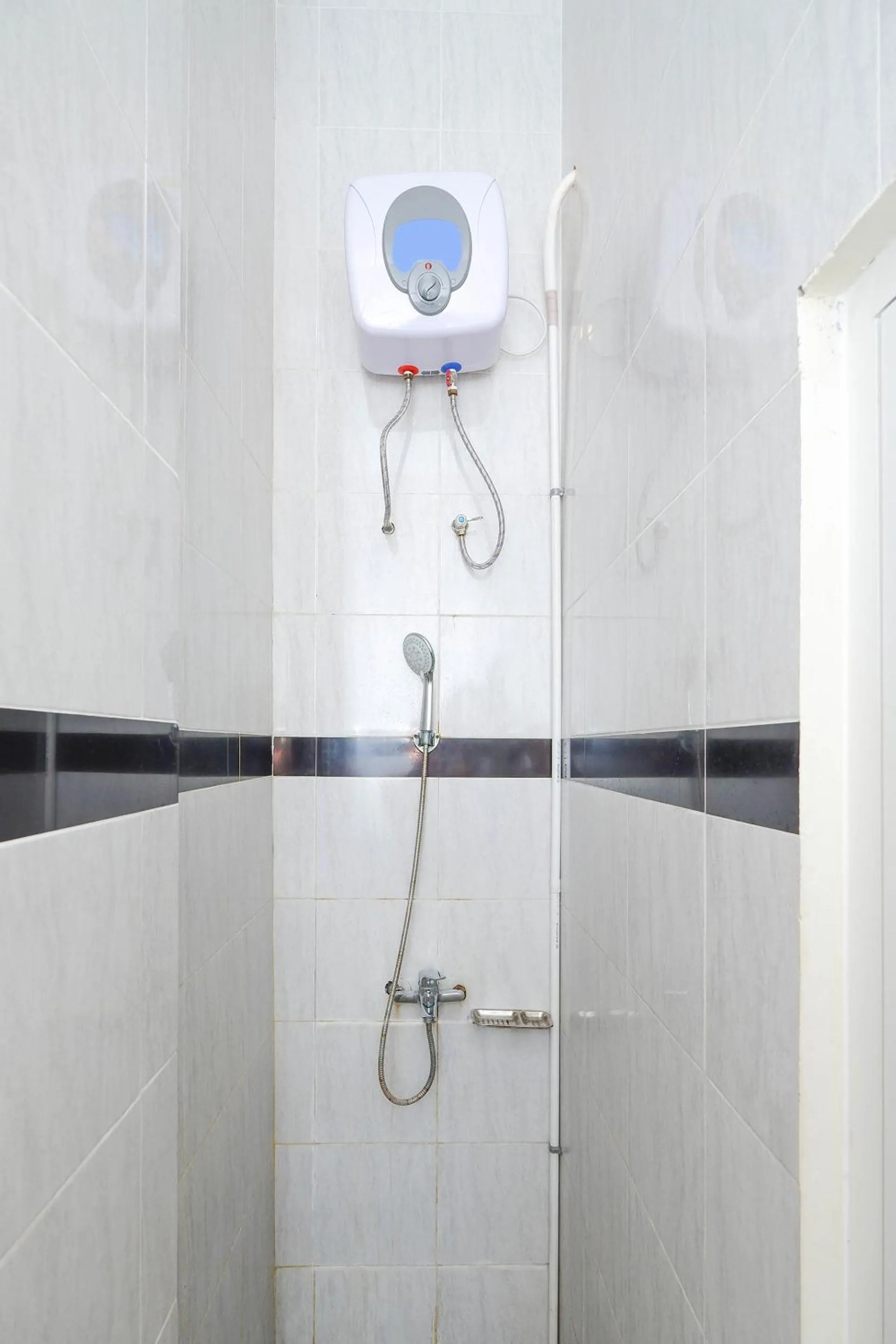 Bathroom in Hotel O Unta Residence